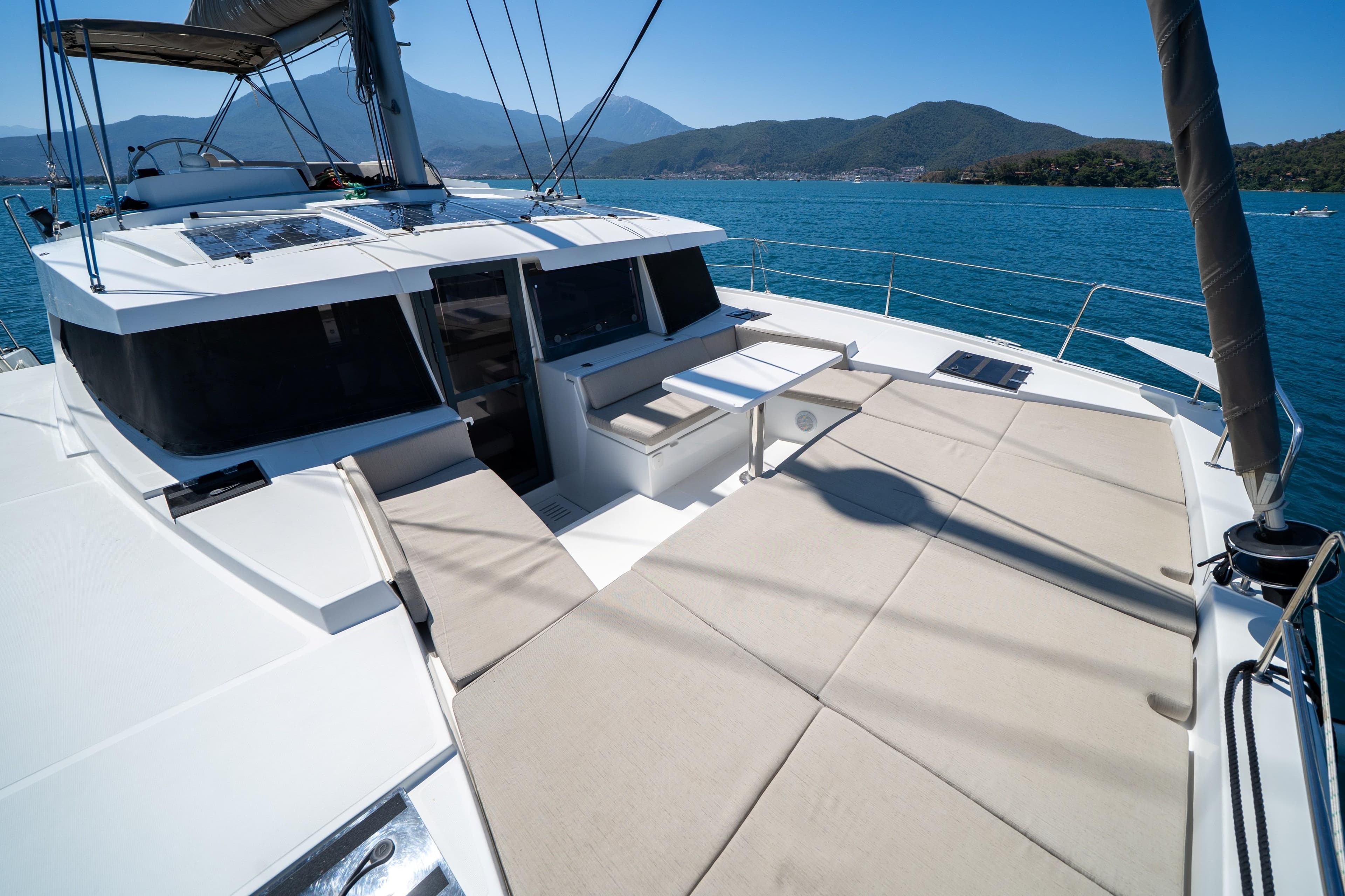 Luxurious 2022 Bali 4.2 catamaran with spacious deck, scenic ocean view, and comfortable seating.