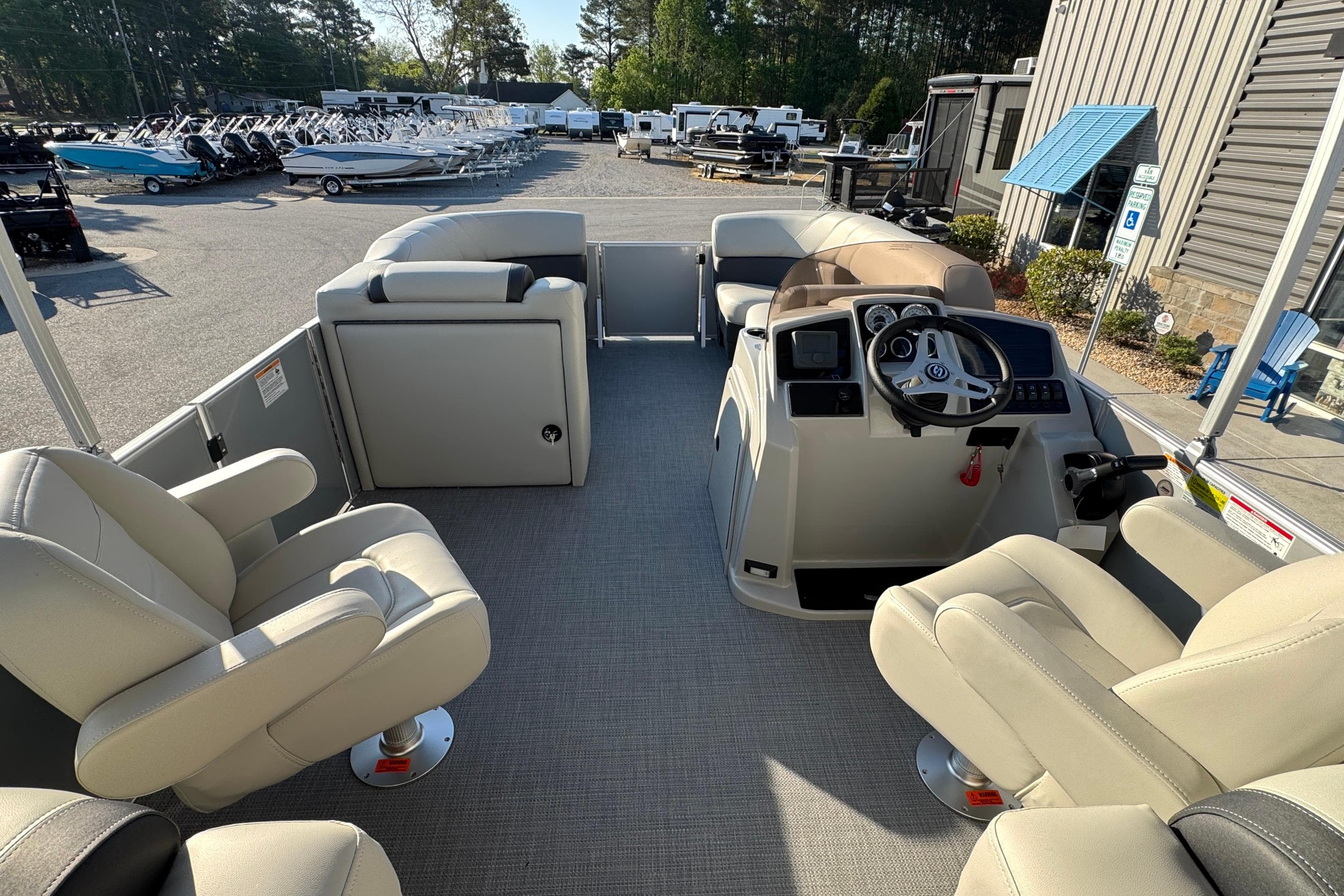 2026 Sylvan Mirage 822 LZ pontoon boat interior with plush seating and modern helm.