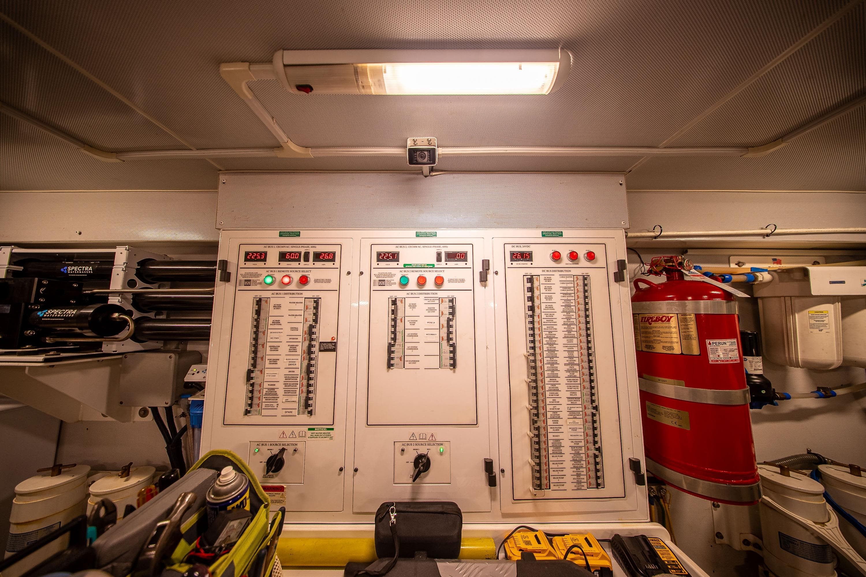 Electrical control panel in a 2012 Marquis 690 yacht engine room.