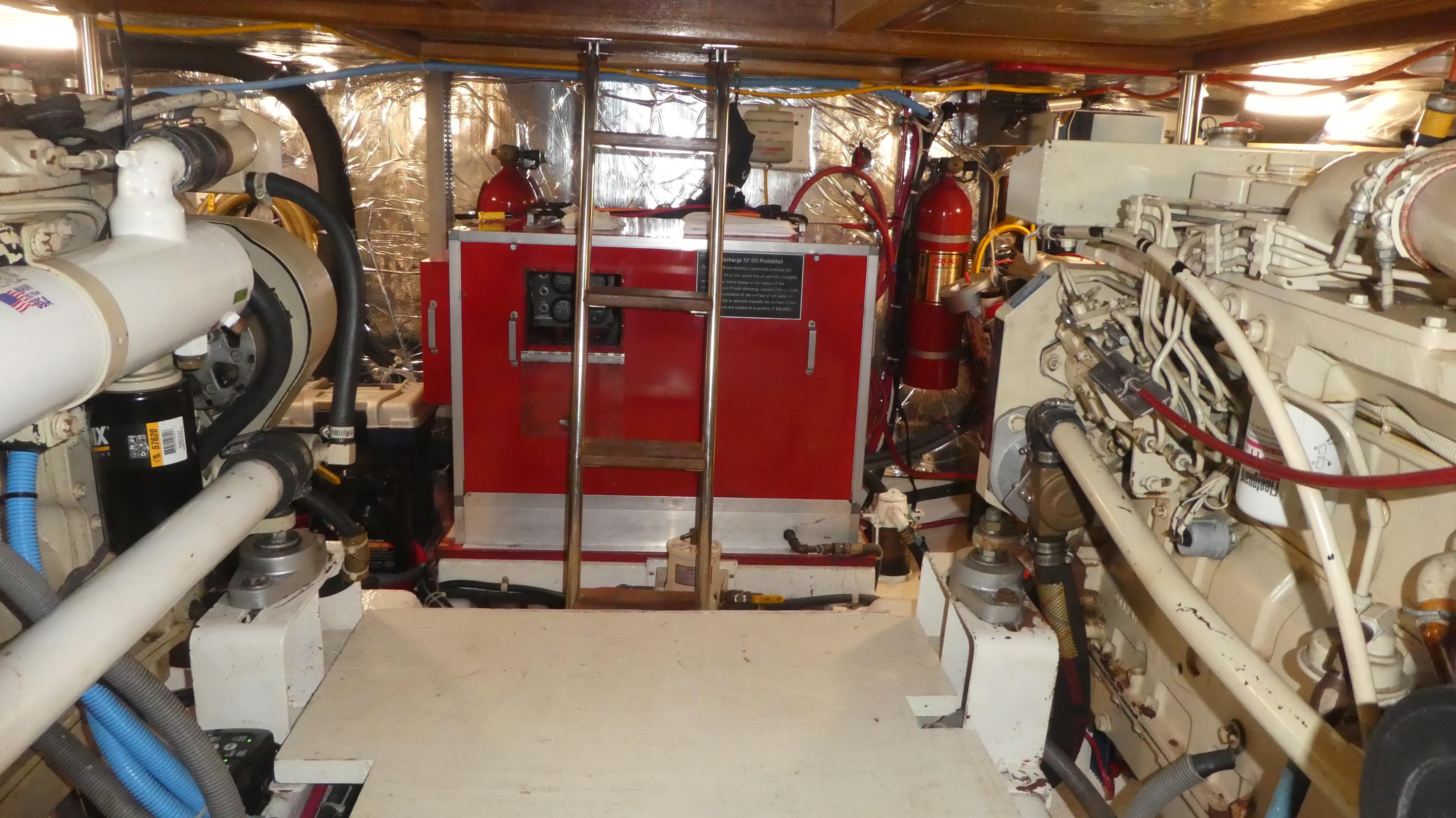 Engine room of 1992 Ocean Alexander 456 Classicco yacht, featuring machinery and equipment.
