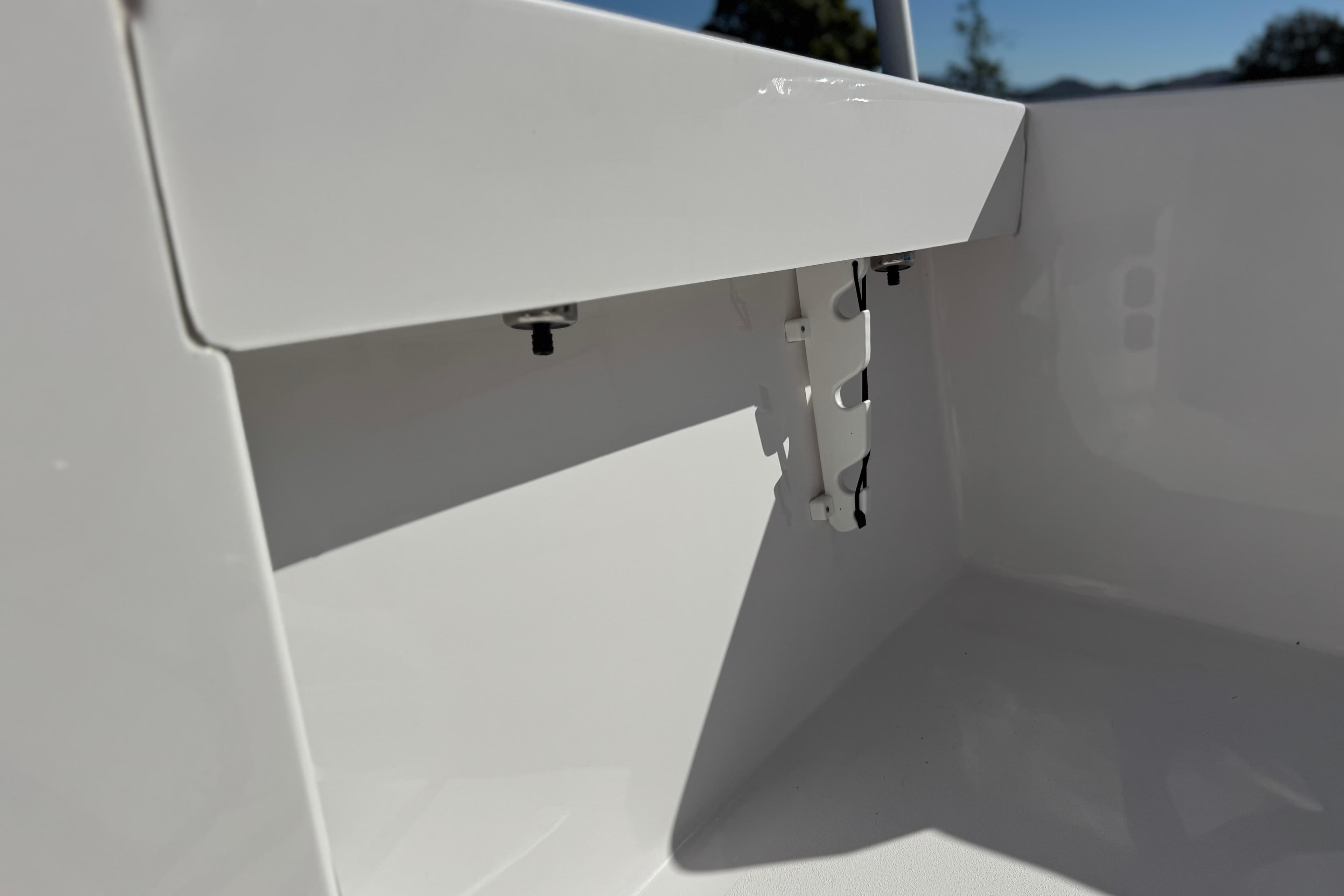 2024 Aquasport 2200 Center Console interior detail, showcasing sleek white finish.