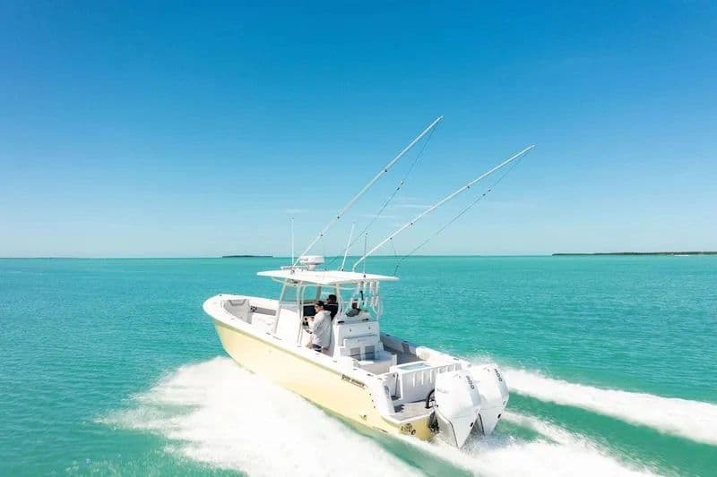 Reef Runner 340 Center Console 2023 on turquoise waters.