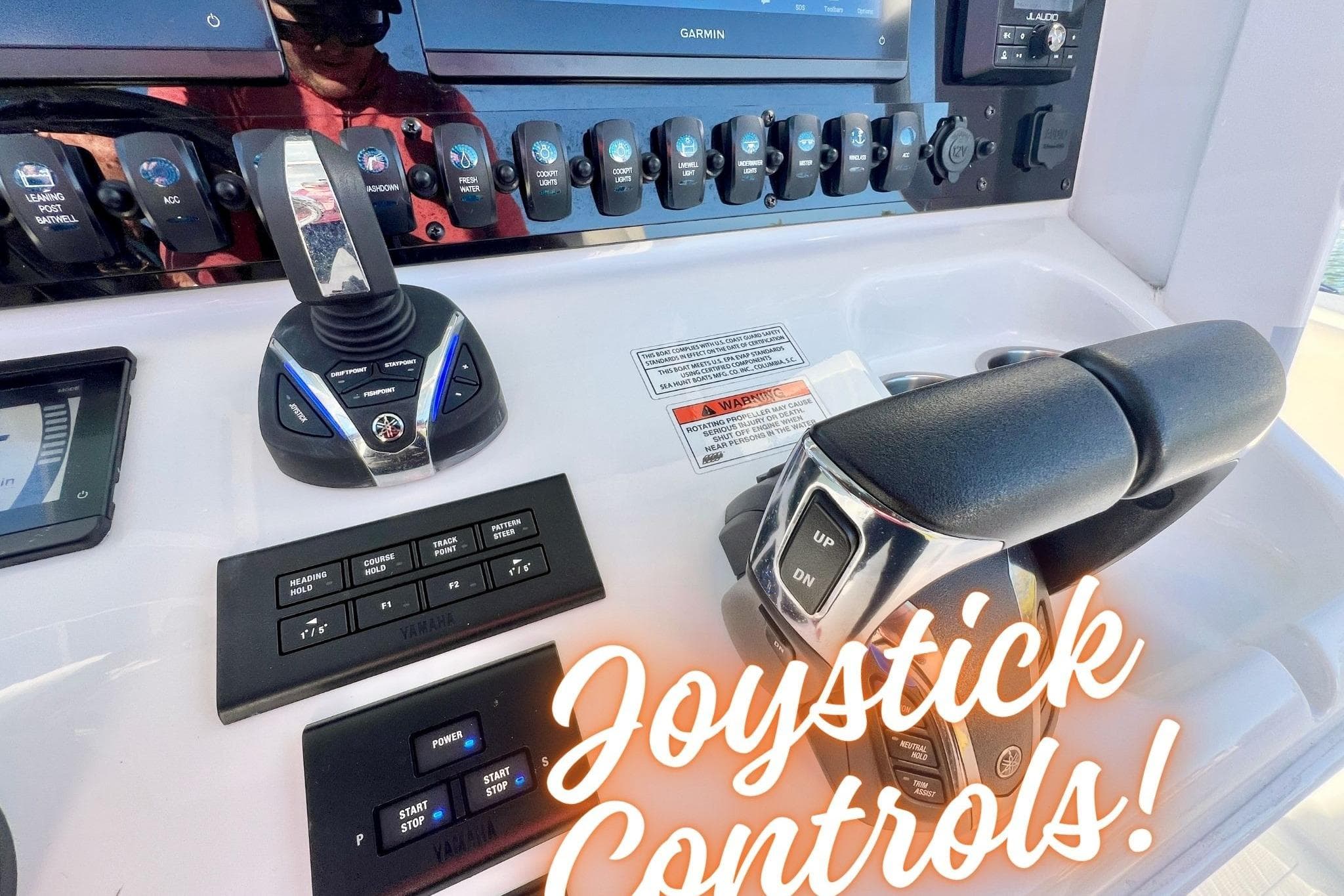 Joystick controls on 2022 Sea Hunt Ultra 265 SE boat dashboard.