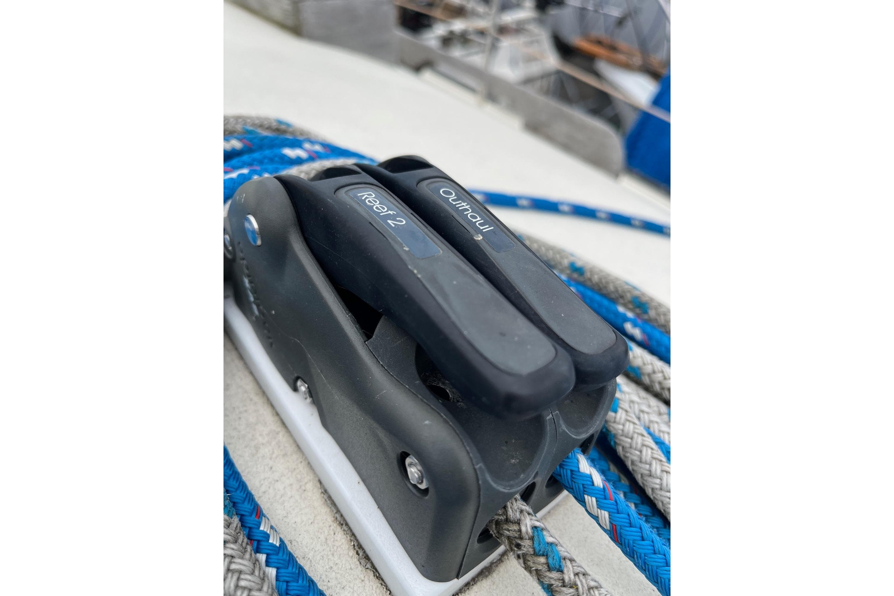 Close-up of a rope clutch on a 1980 Hinterhoeller Nonsuch 30 Classic sailboat.