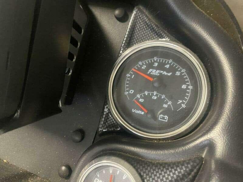 Triton 20 TRX Elite 2016 dashboard with RPM and voltage gauges.