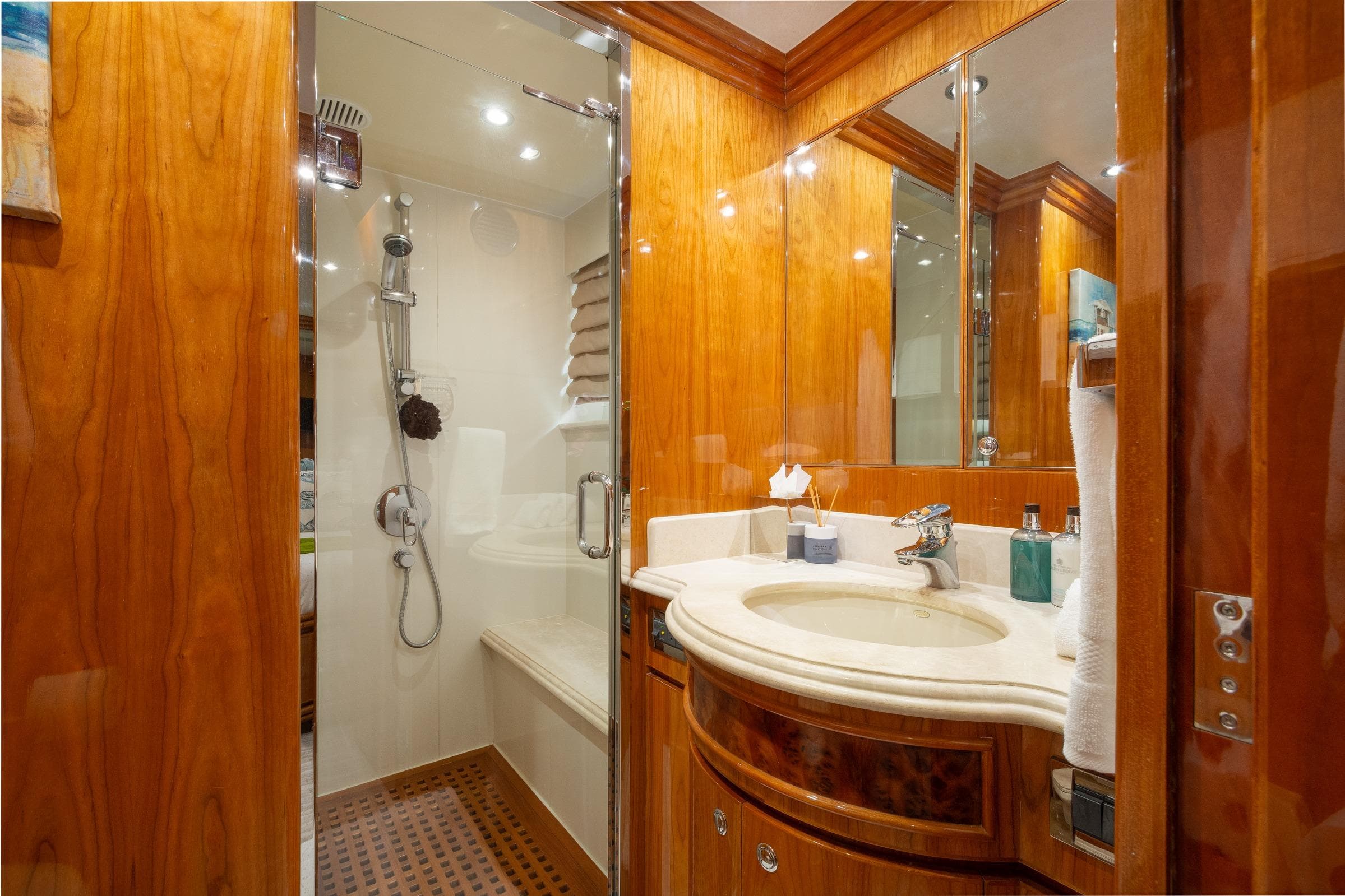 Luxurious 2006 Hargrave Raised Pilothouse yacht bathroom with wood accents and modern fixtures.