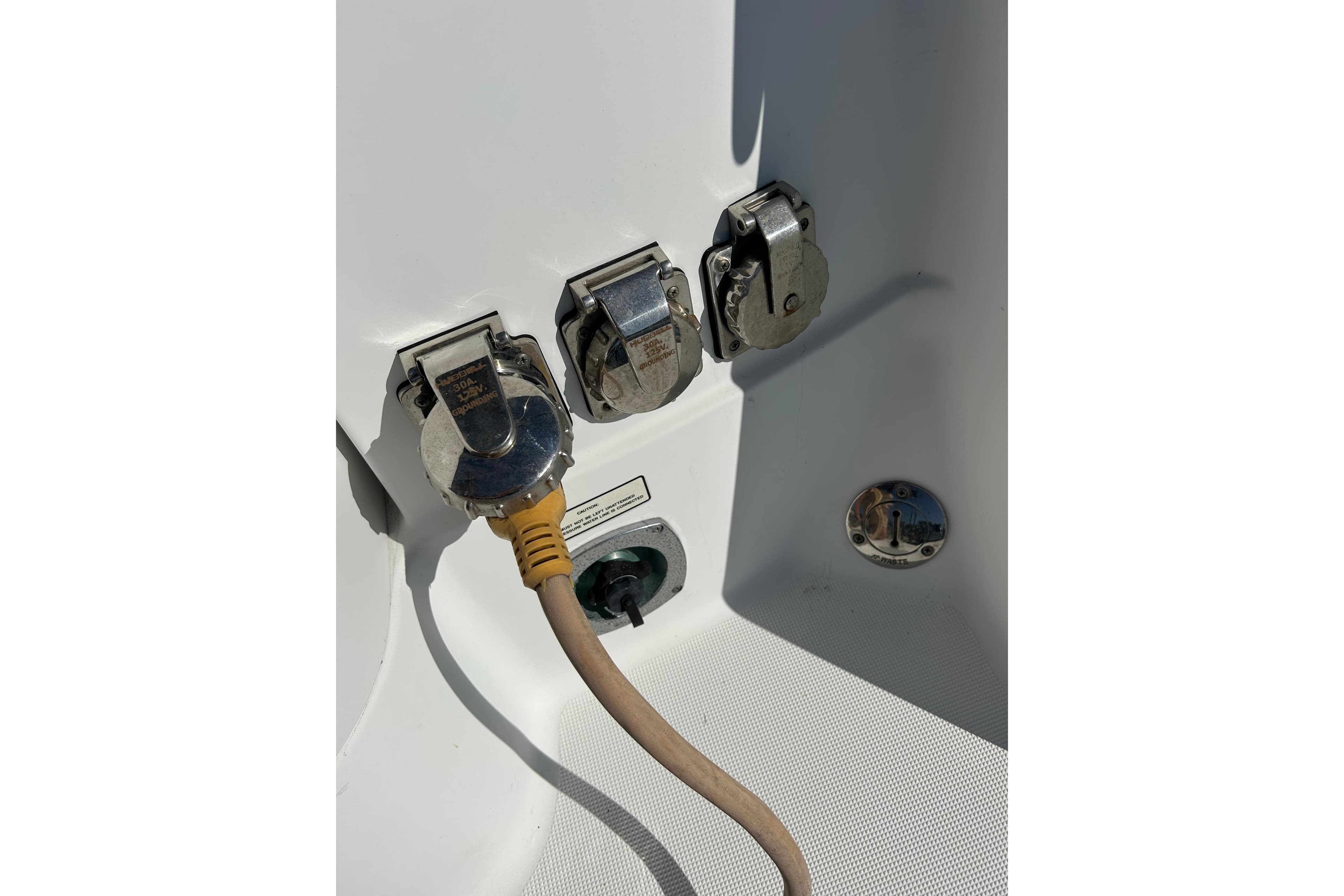 Power connections on a 2008 Formula 34 Performance Cruiser boat.