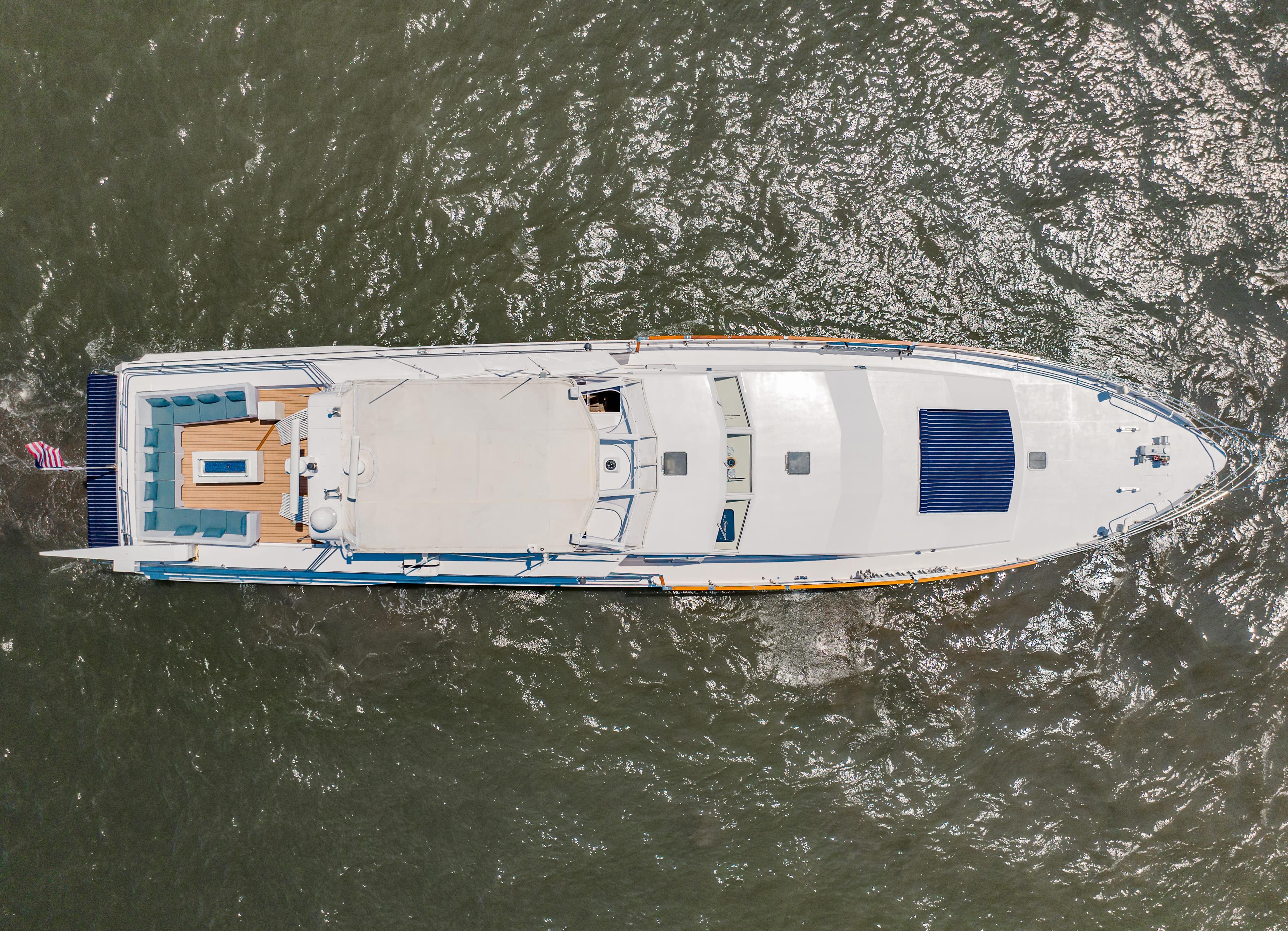 Aerial view of 1987 Guy Couach 97 yacht on water.