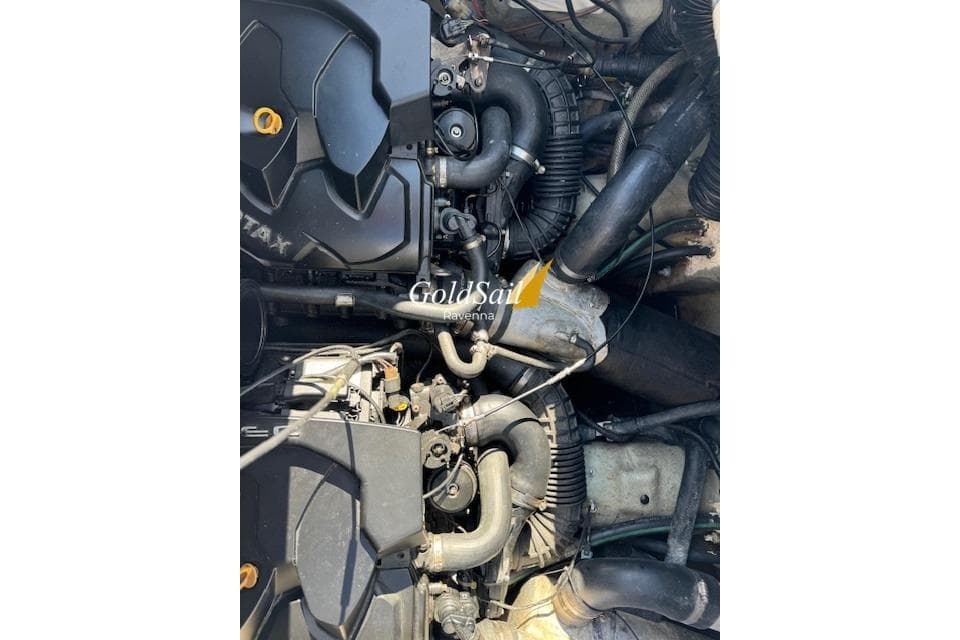 Engine of a 2008 Sea-Doo Wake watercraft, showcasing intricate mechanical components.