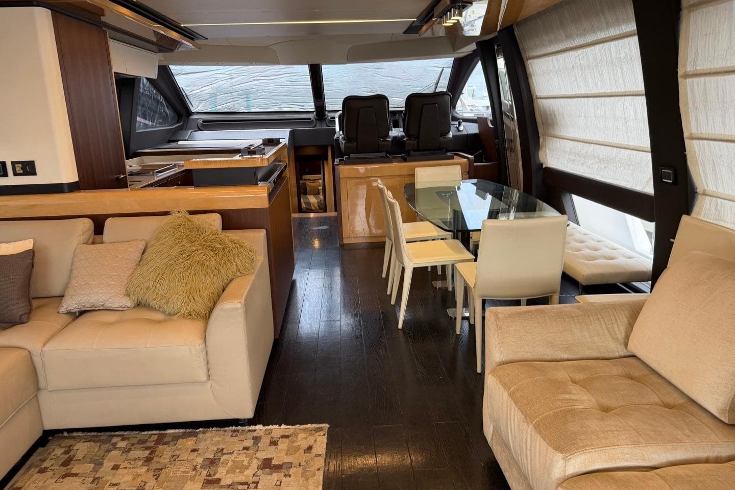 Luxurious interior of 2017 Azimut Fly 72 yacht with elegant seating and dining area.