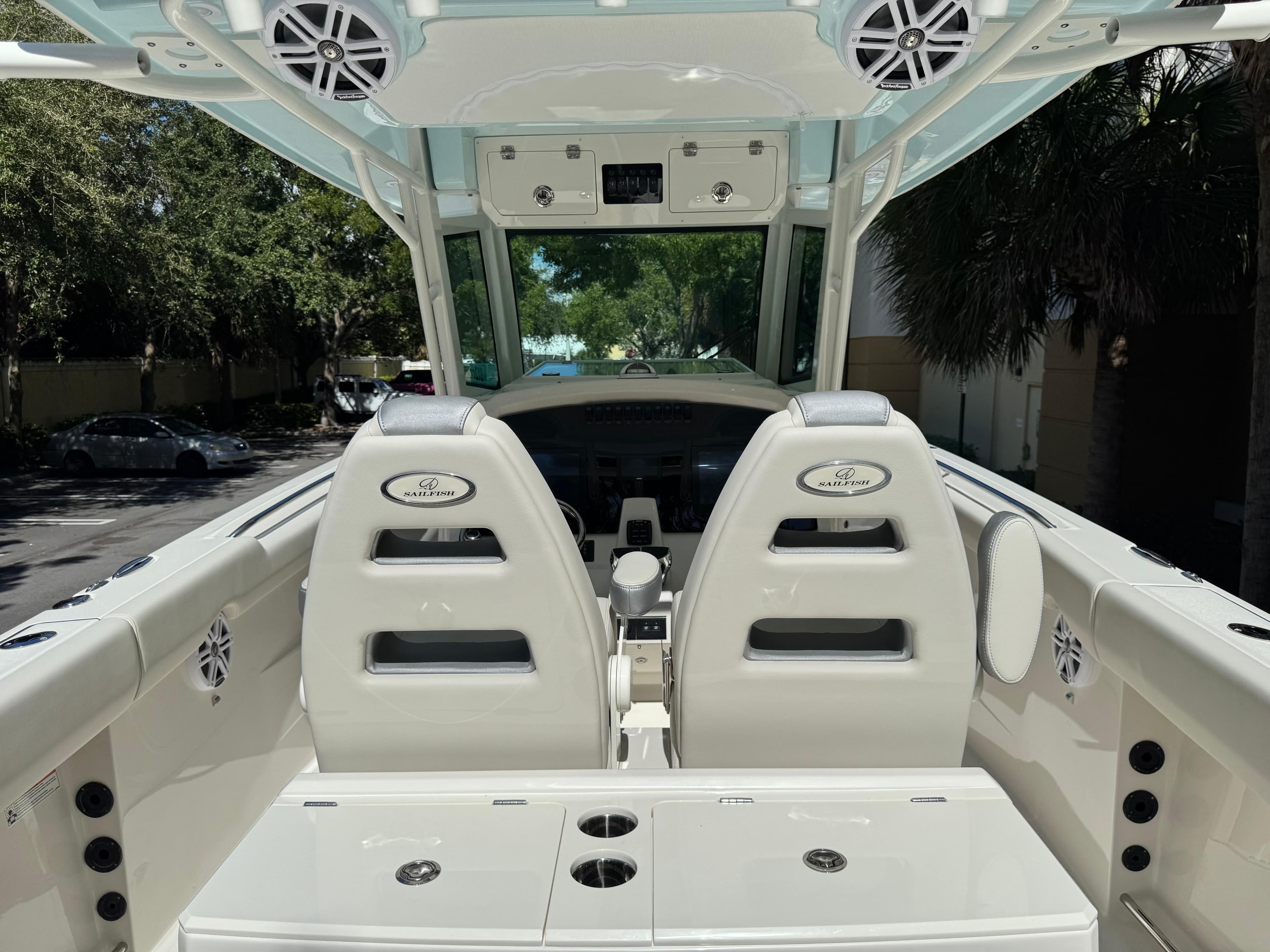 2026 Sailfish 312 CC boat interior with dual seats and modern dashboard.