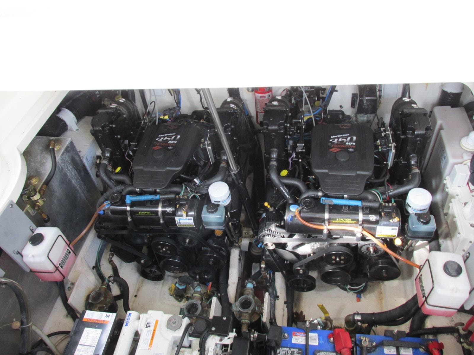Engine room of 2006 Sea Ray 300 Sundancer with dual engines.