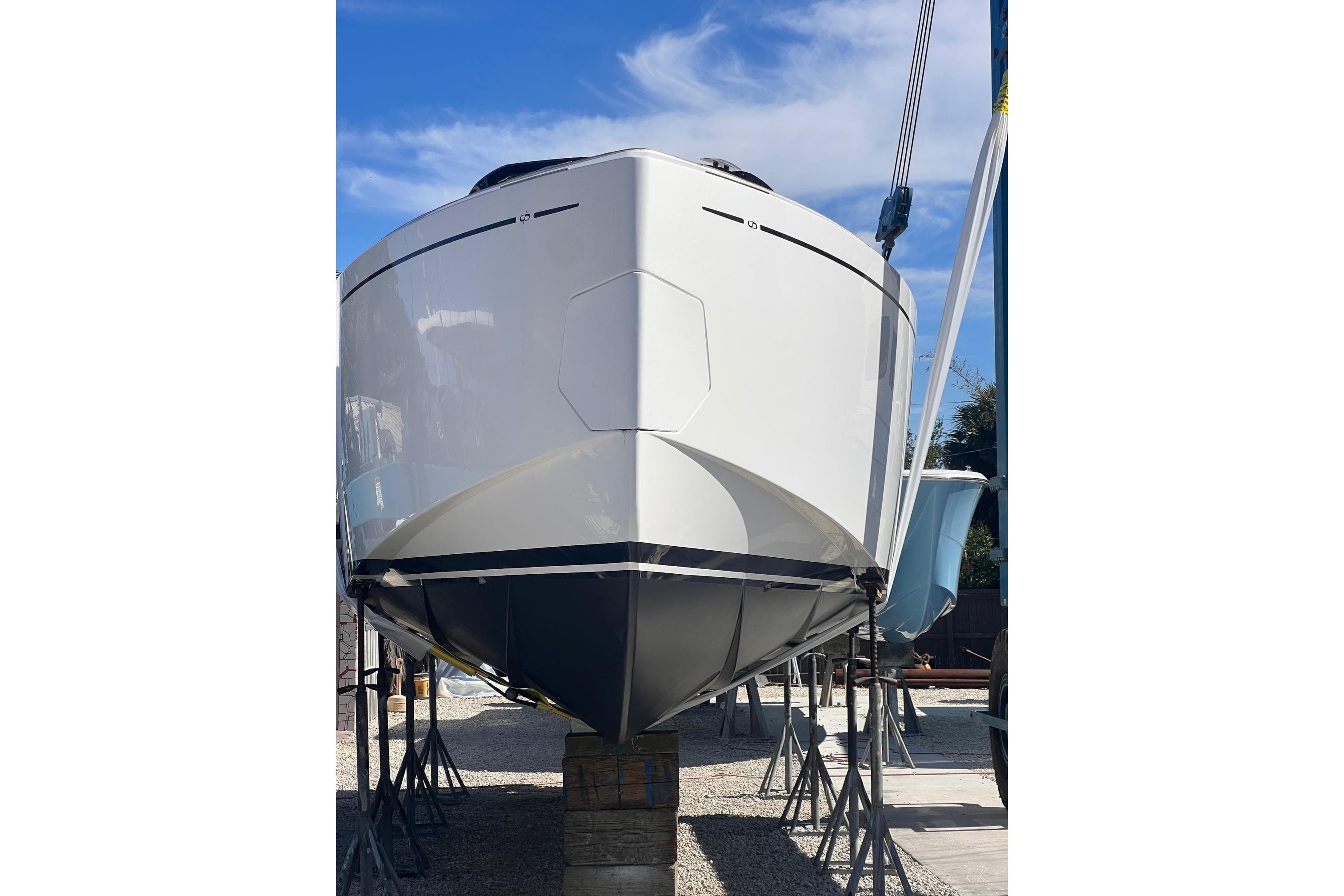 2025 Pardo Yachts P38R on dry dock, showcasing sleek hull design.