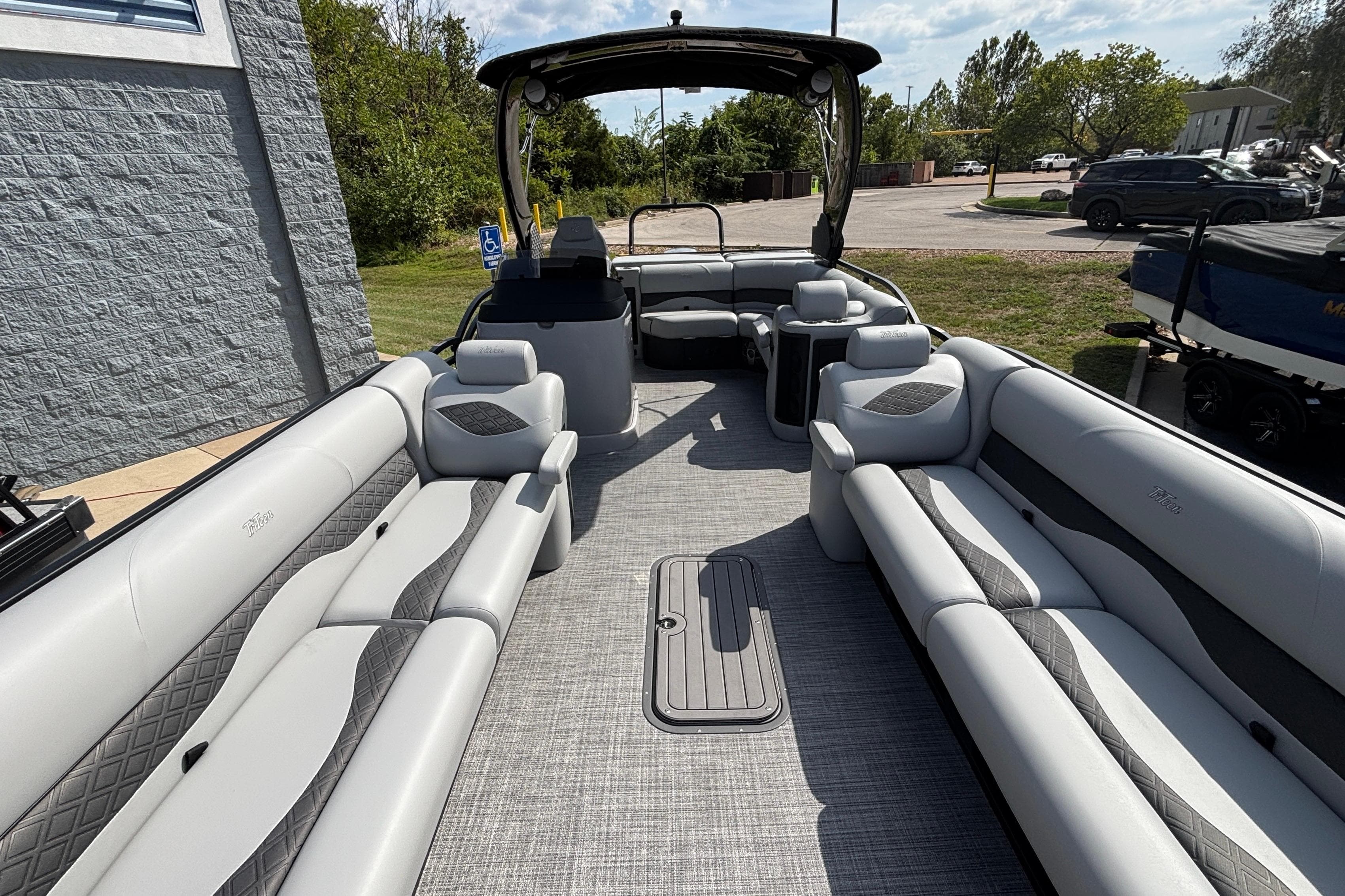 Interior of 2026 JC NEPTOON 27TT SPORT pontoon boat with luxurious seating and modern design.
