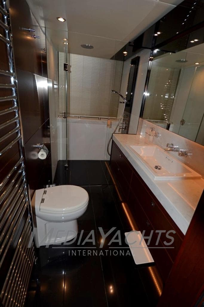 Luxurious bathroom in 2016 Princess S72 yacht with modern fixtures and sleek design.