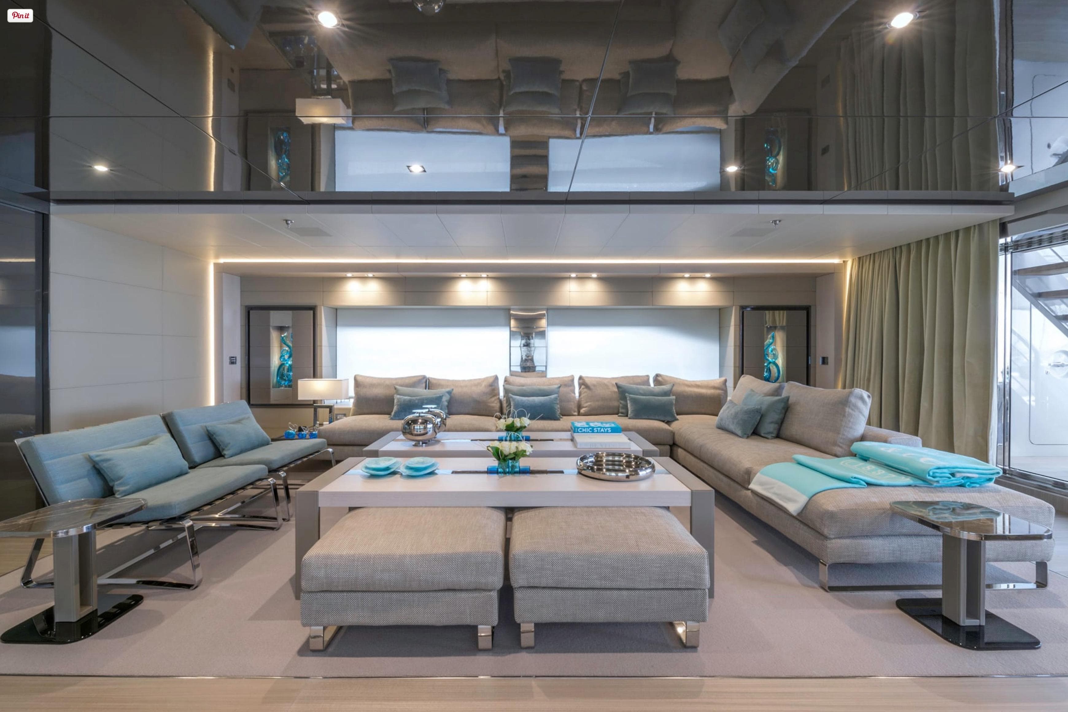 Luxurious interior of 2018 Rossinavi Custom yacht with modern seating and elegant decor.