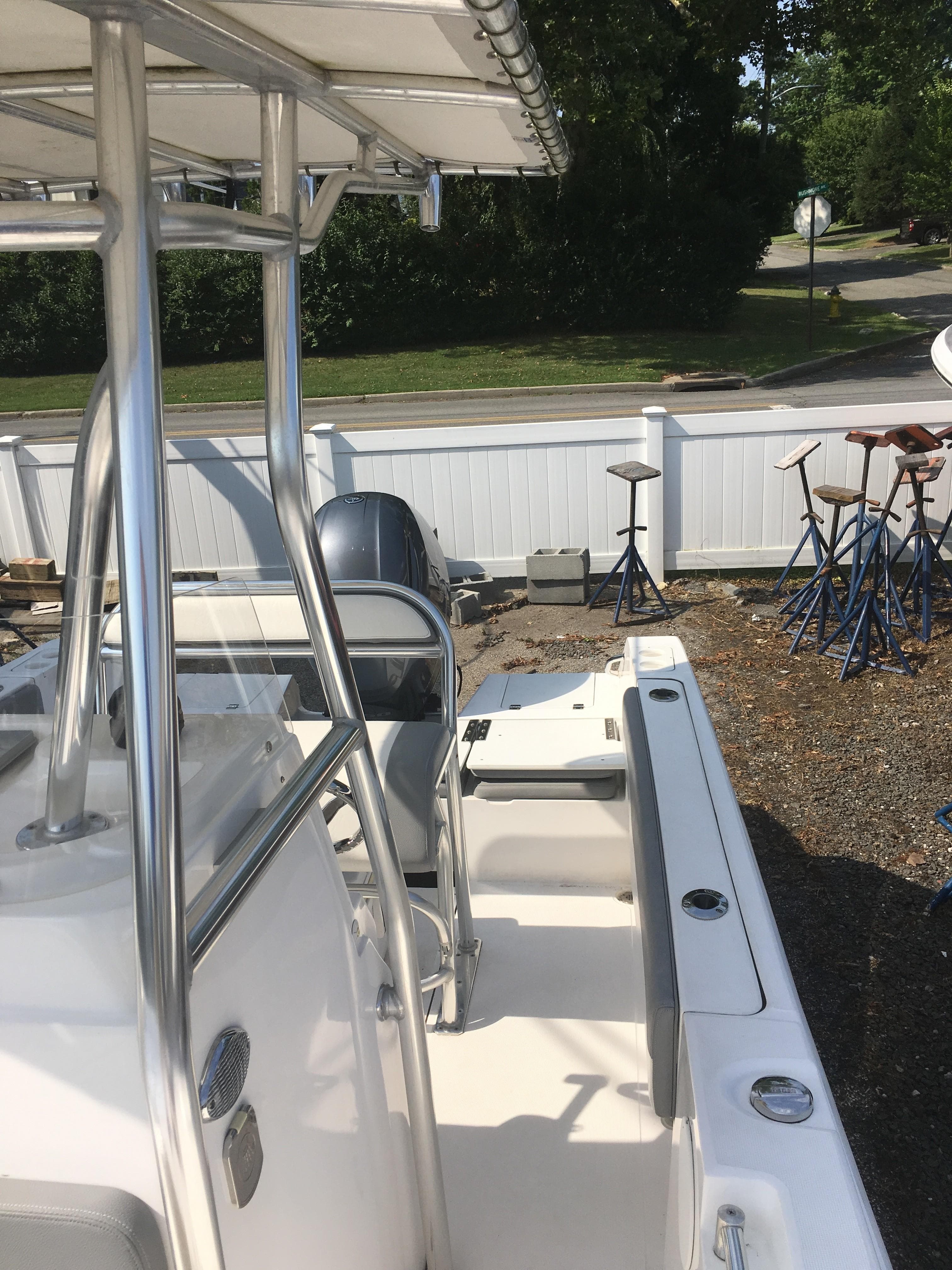 2016 Release 208 RX boat parked outdoors.