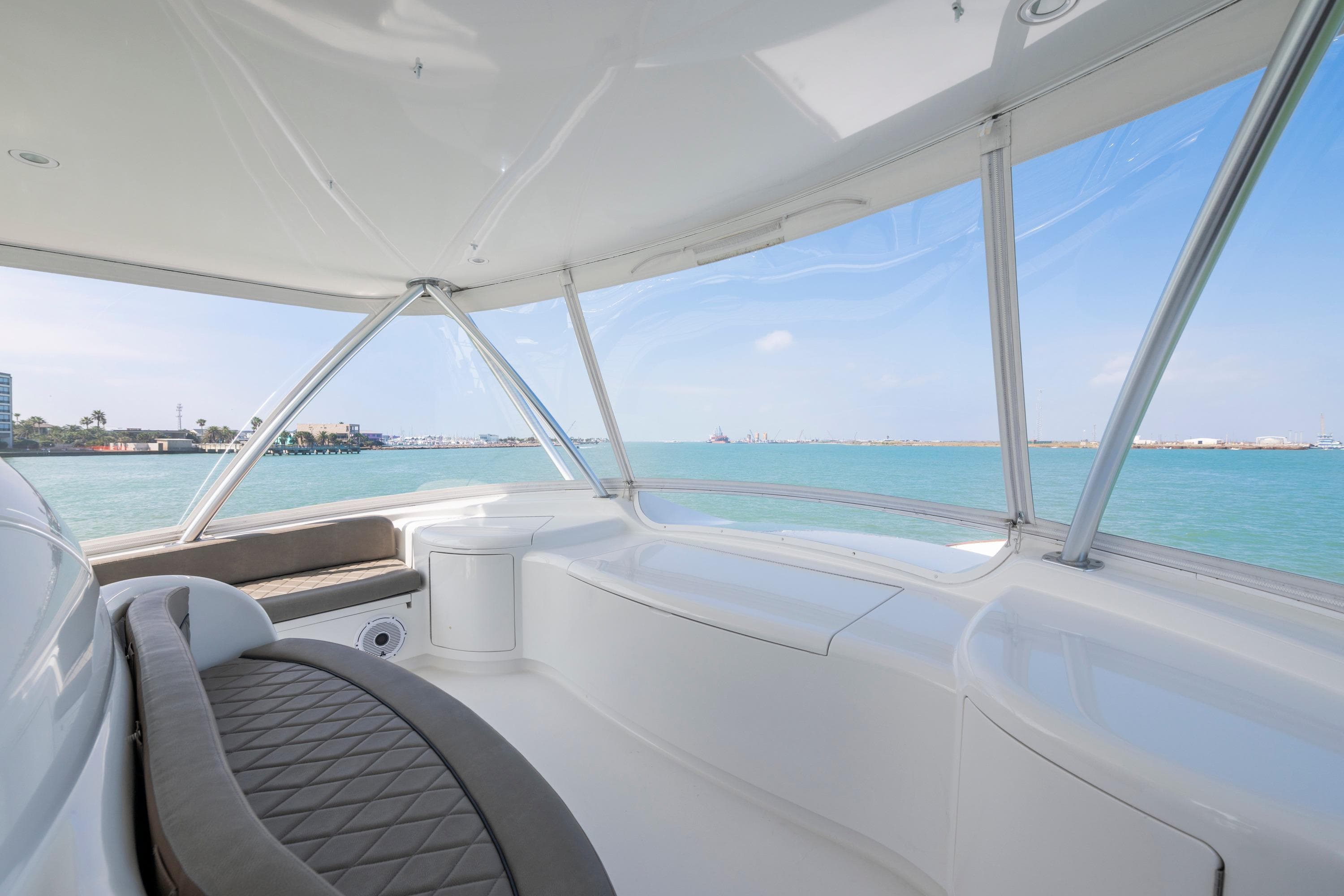 Luxurious interior of 2011 Viking 70 Convertible yacht with ocean view.