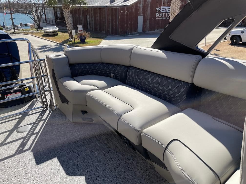 2025 Barletta Lusso 25QSS boat interior with luxurious seating and elegant design.