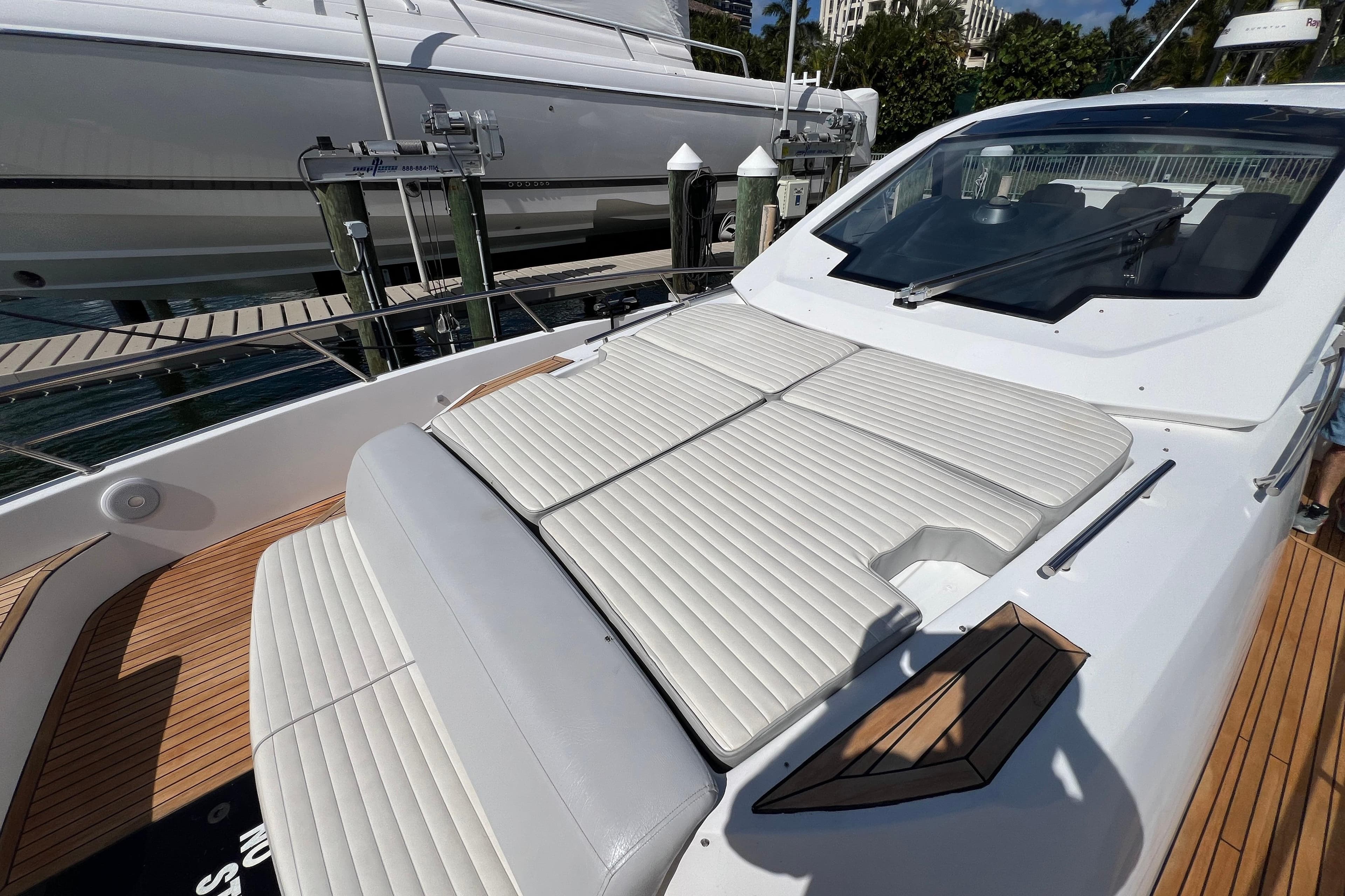 2018 Azimut Verve 40 yacht with sleek white deck and cushioned seating.
