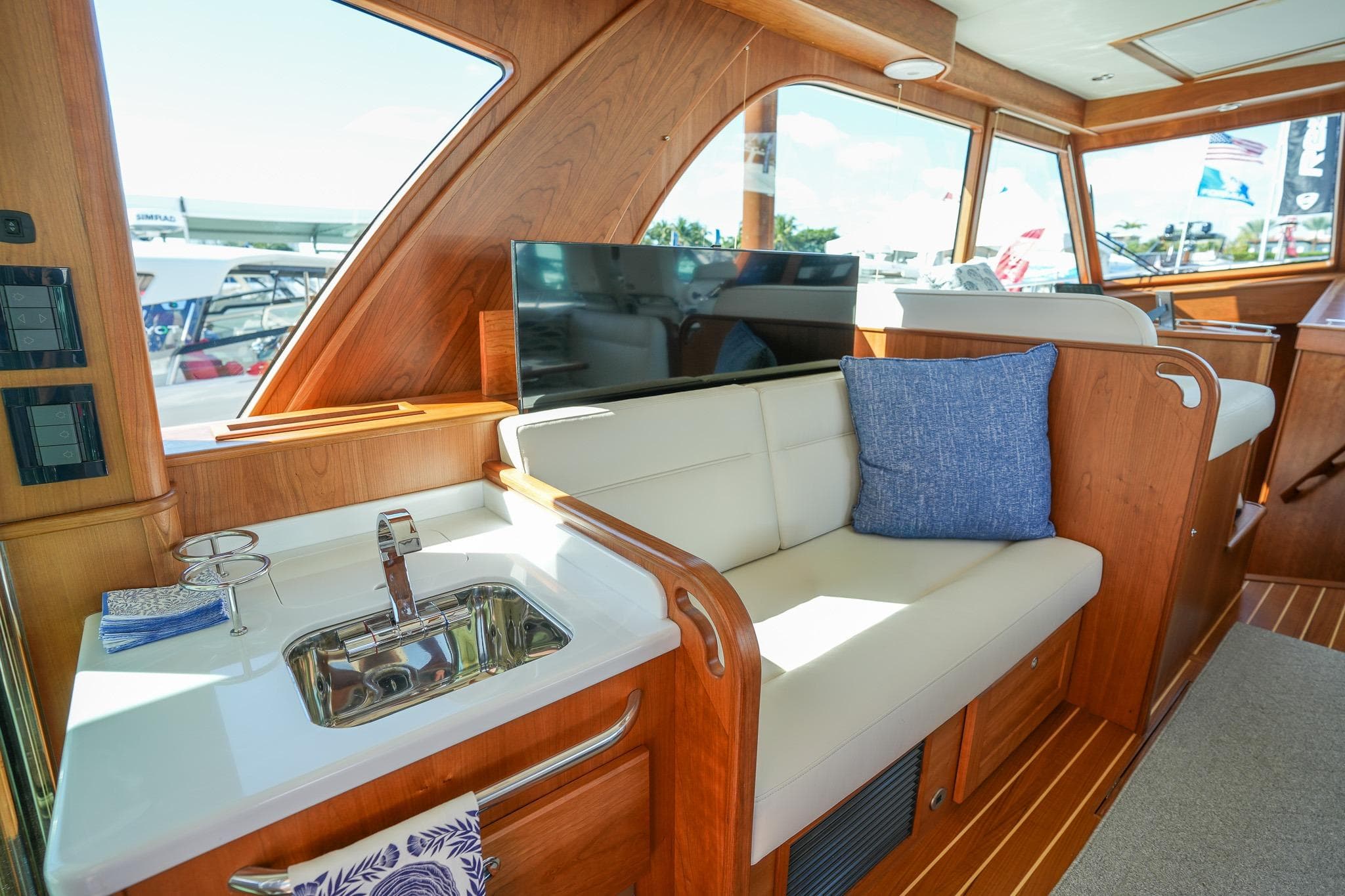 Luxurious interior of 2026 Sabre 51 Salon Express yacht with elegant seating and modern amenities.