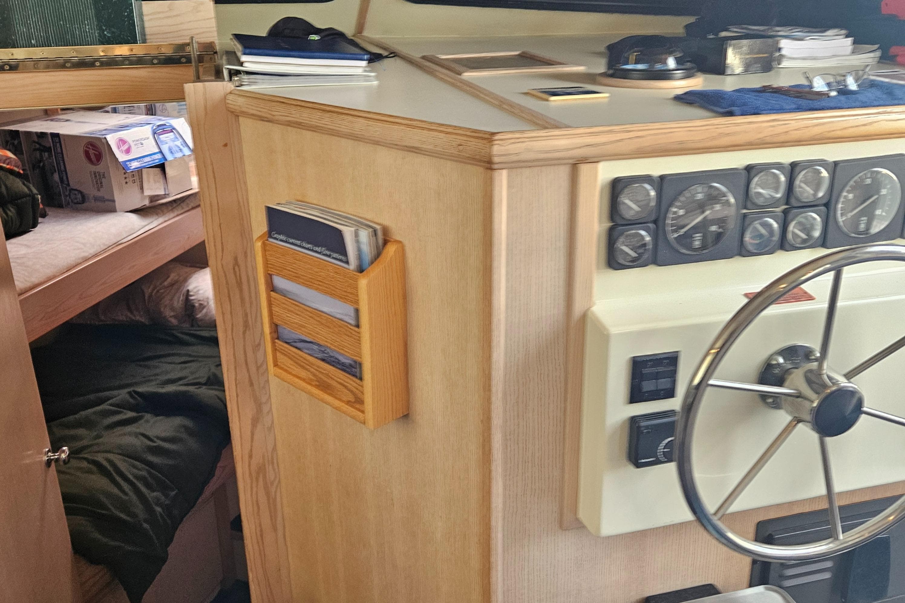 1991 Tollycraft Euro Sport Sedan interior with steering wheel and control panel.