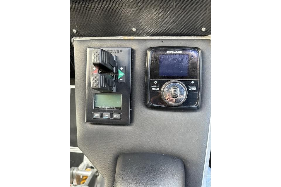 Control panel of 2019 Anytec A30 boat featuring Zipwake and Side-Power systems.