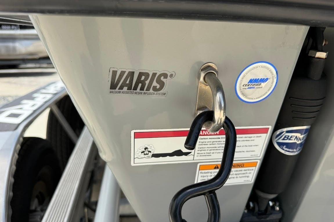 2023 Maverick 18 HPX-V boat featuring VARIS technology and certification labels.