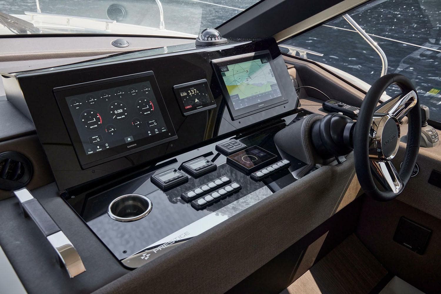 Manufacturer Provided Image: 2025 Prestige F4.9 yacht dashboard with advanced navigation and control systems.