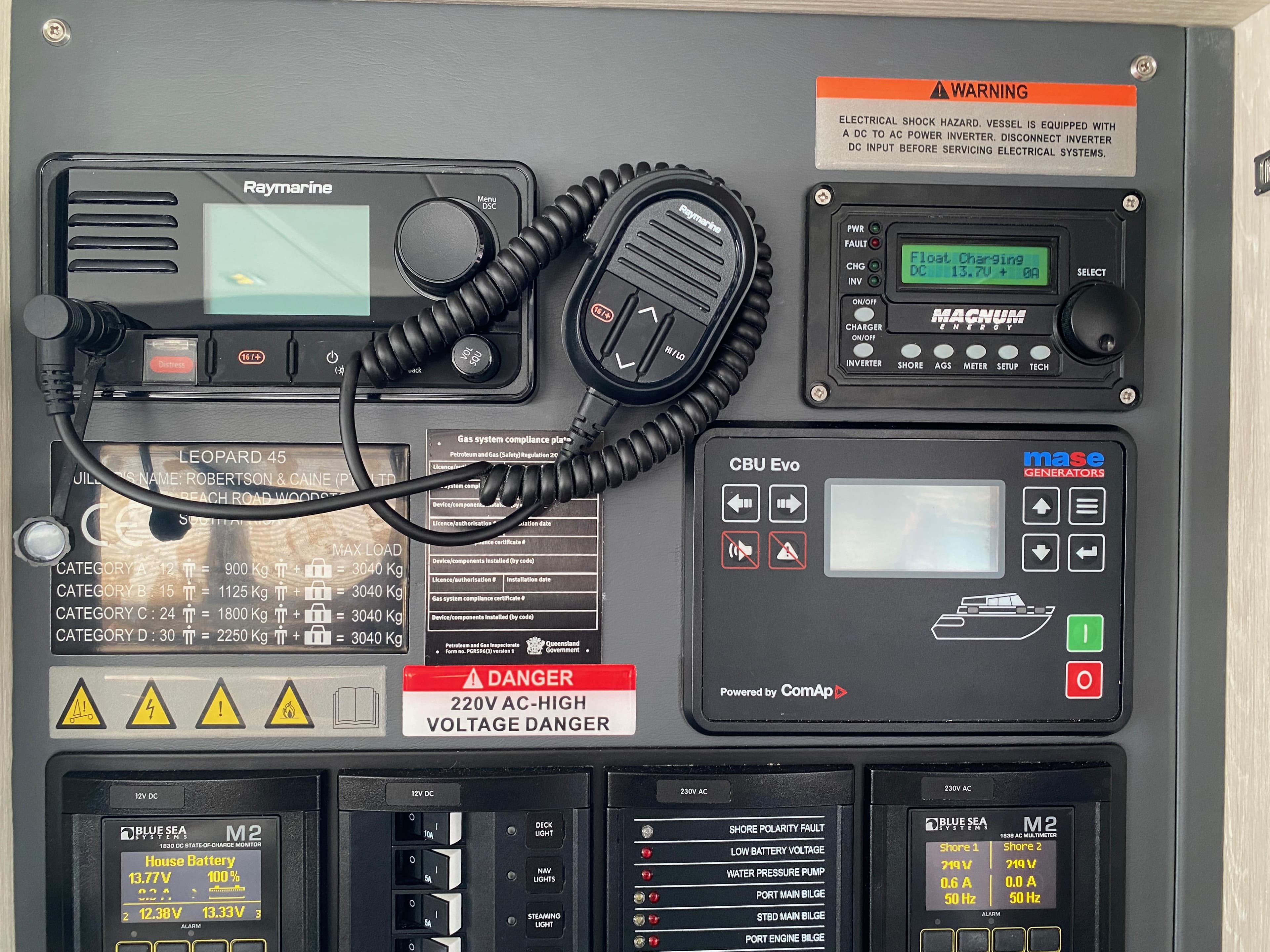 Control panel of a 2021 Leopard 45 yacht with navigation and electrical systems.
