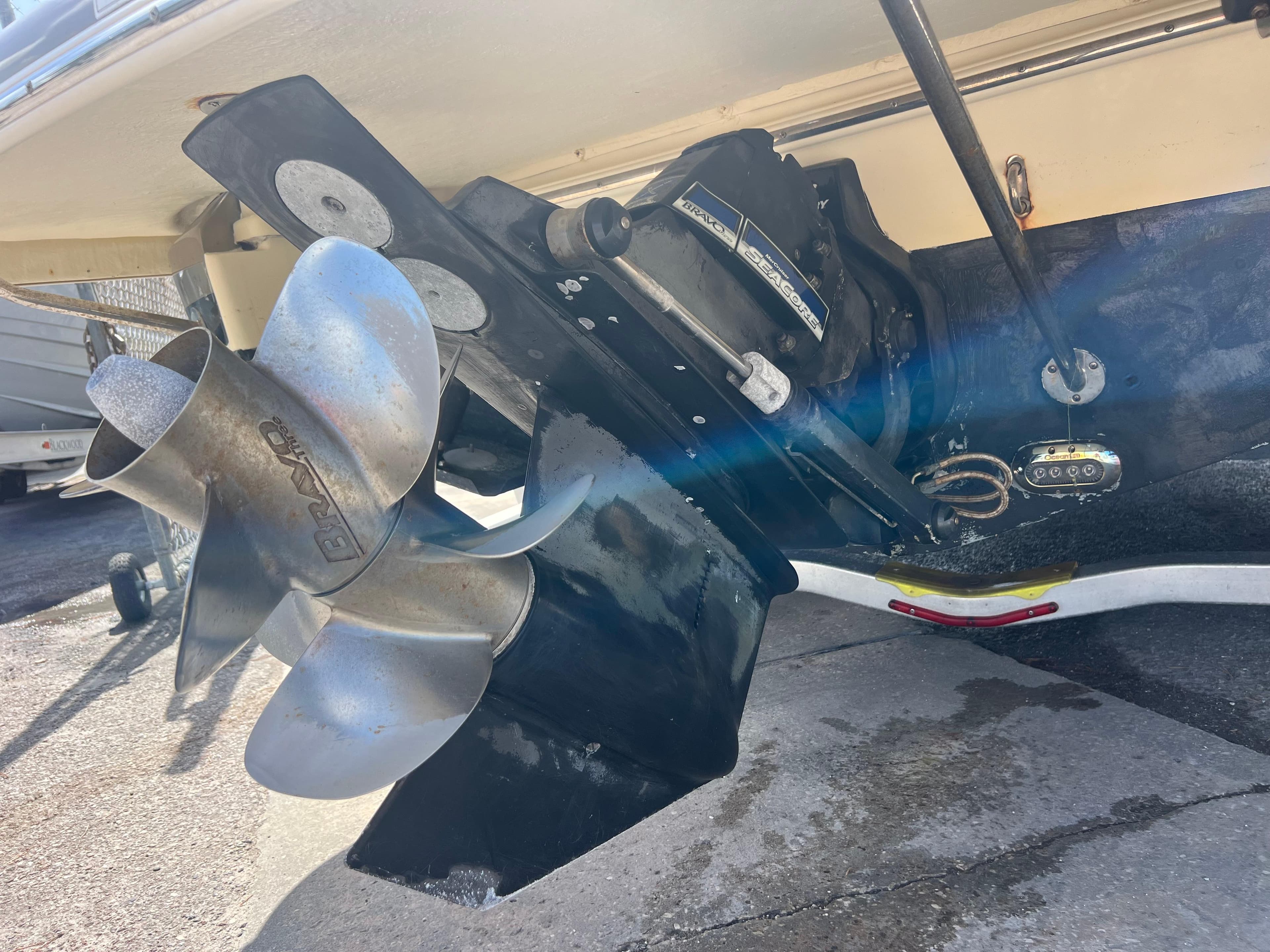 2019 Chris-Craft Corsair 27 boat propeller and drive system close-up.