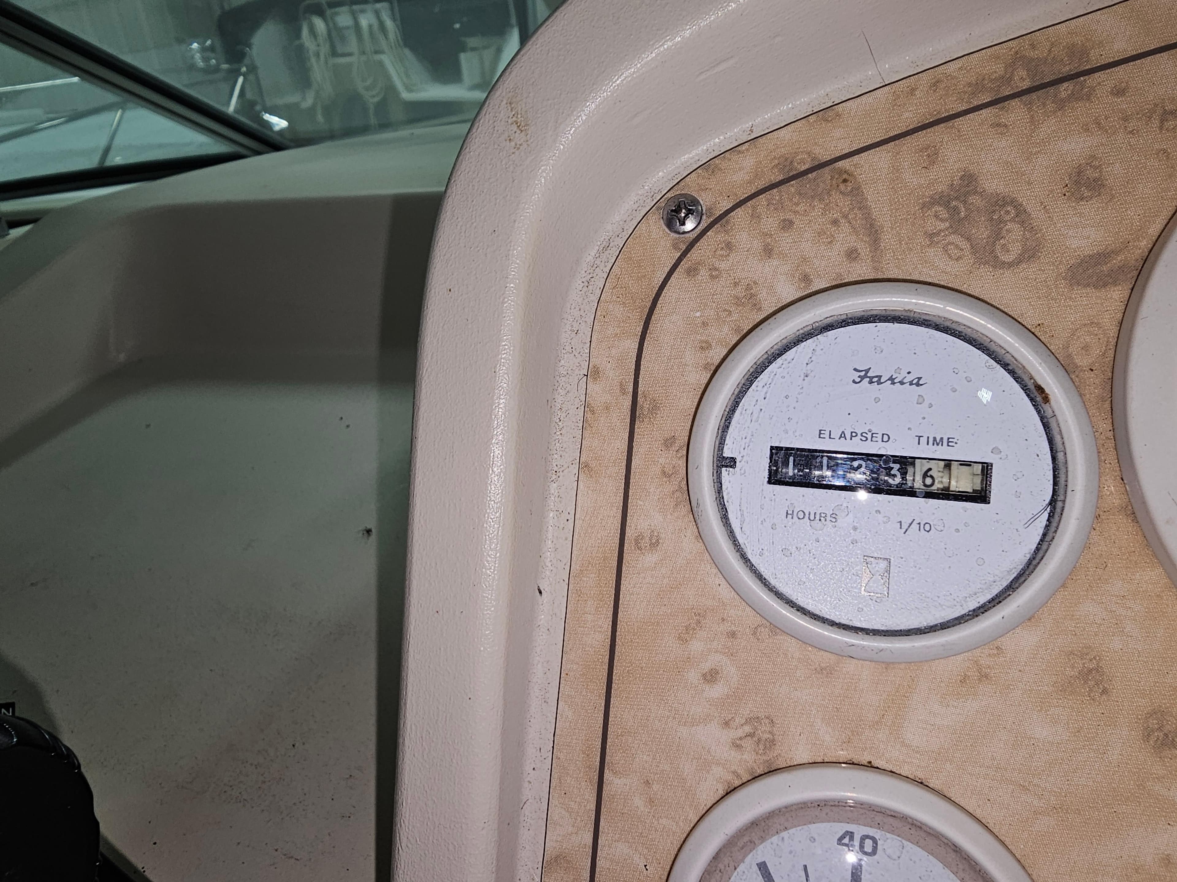 1997 Cruisers Yachts 3120 Aria dashboard with hour meter.