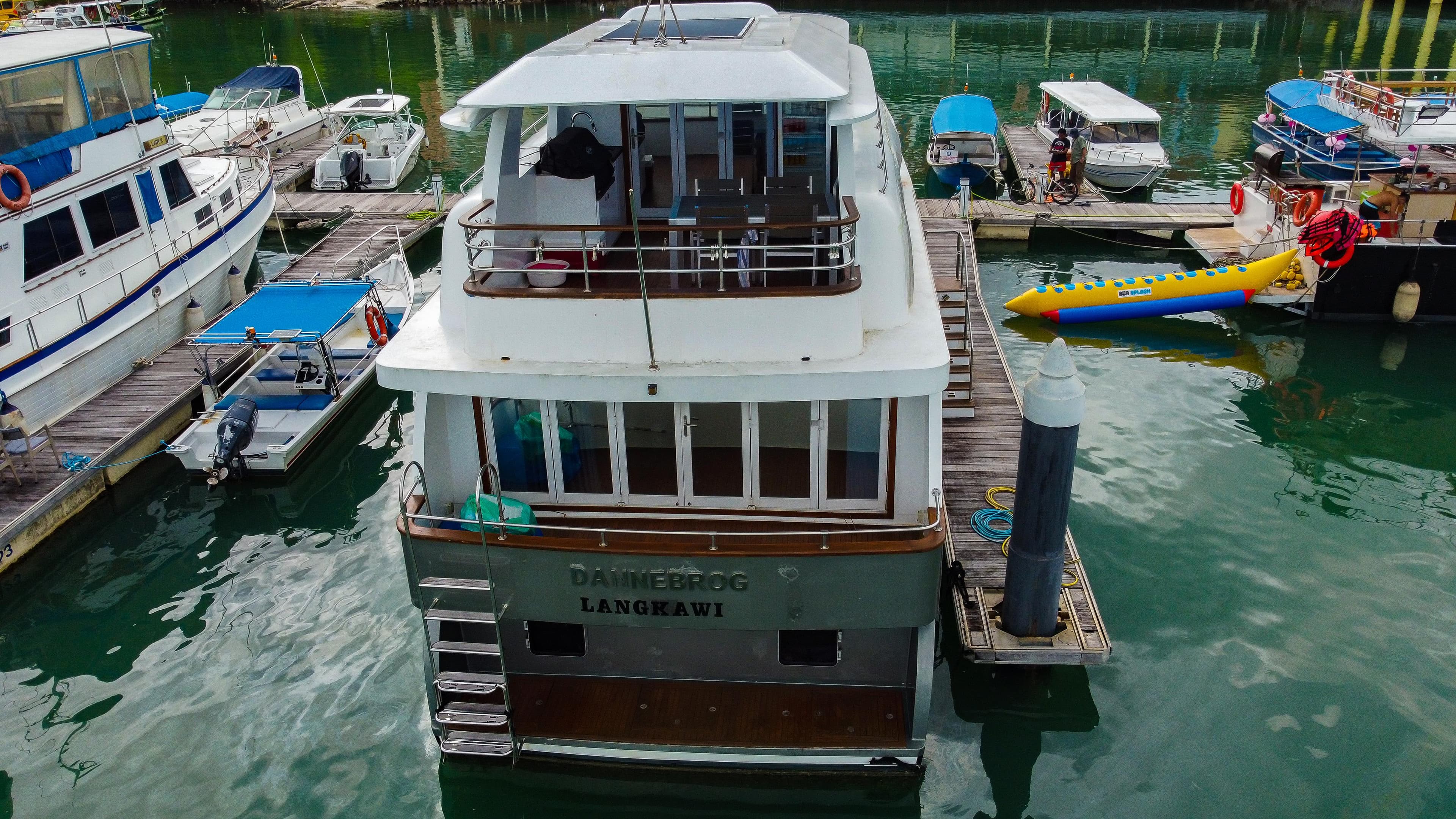 Aerial view of 2008 Bondway EX-11 yacht docked at marina.