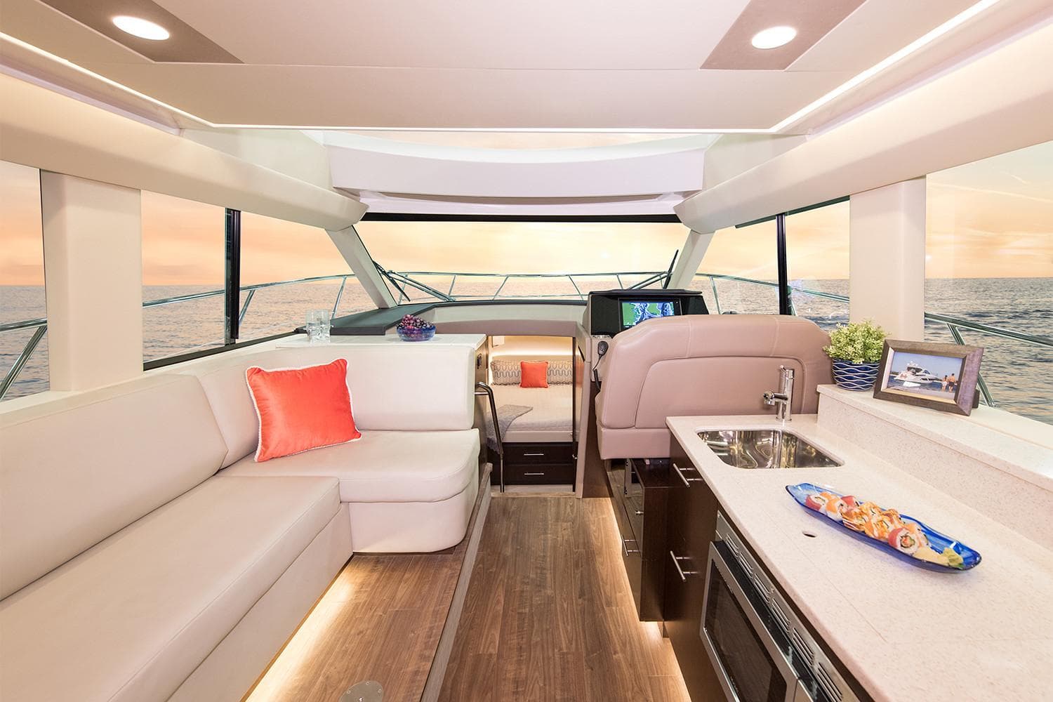 Manufacturer Provided Image: Interior of 2019 Regal 42 Grande Coupe yacht with modern furnishings and ocean view.