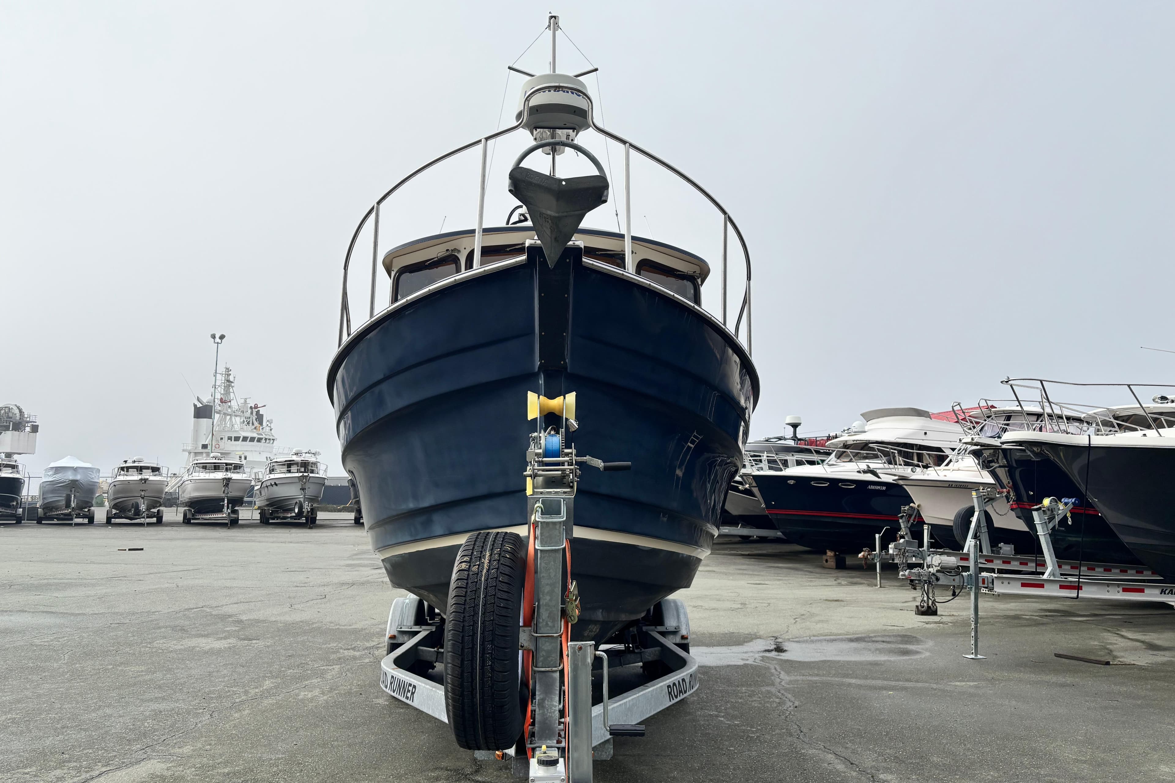 2010 Ranger Tugs R-25 SC on a trailer at the harbor.