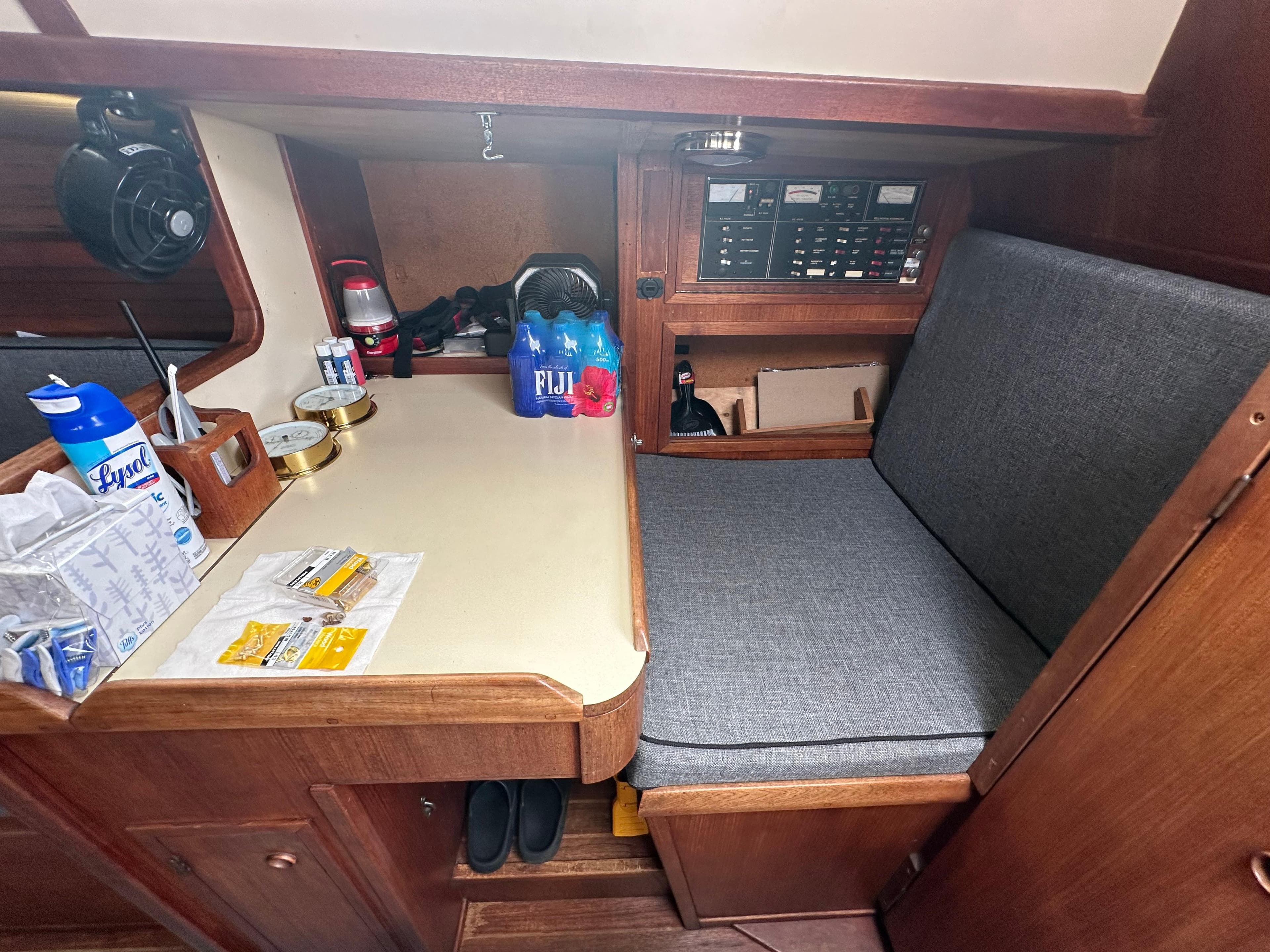 1979 Valiant 37 sailboat interior with navigation station and storage.