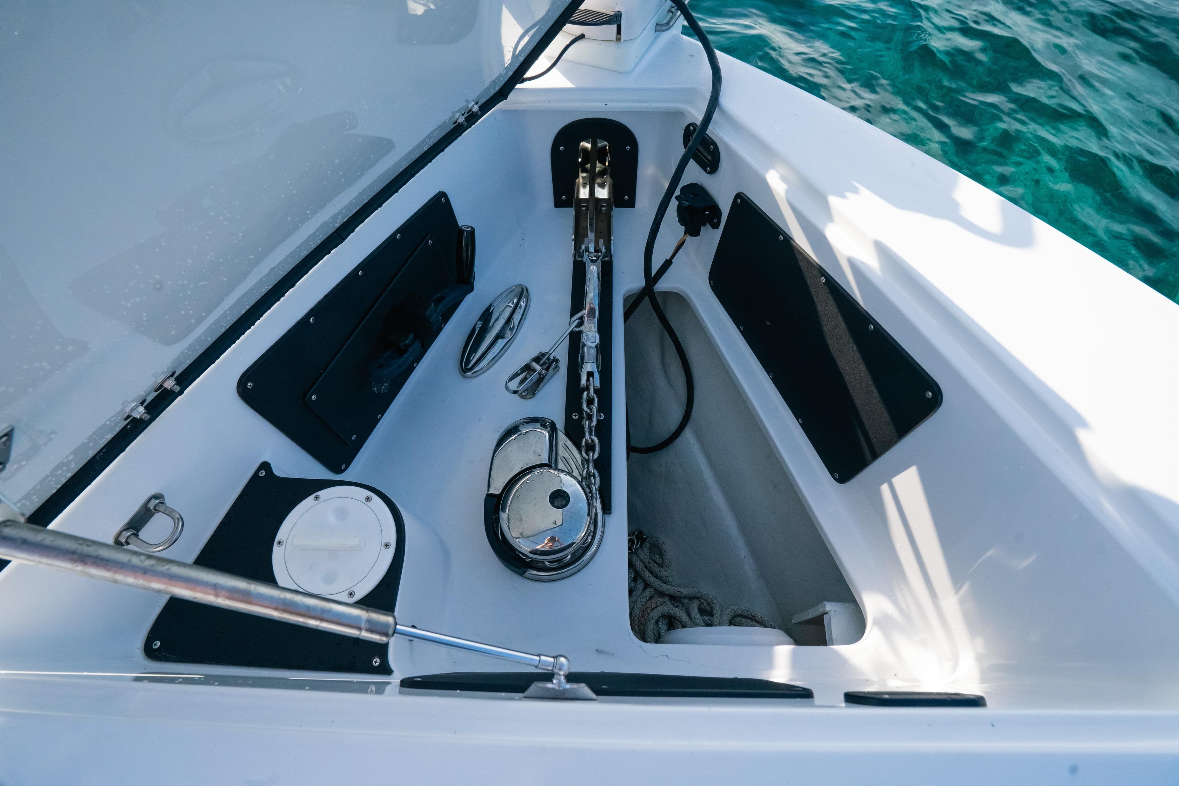 Anchor compartment of 2022 Nor-Tech 392 Super Fish boat with visible chain and equipment.