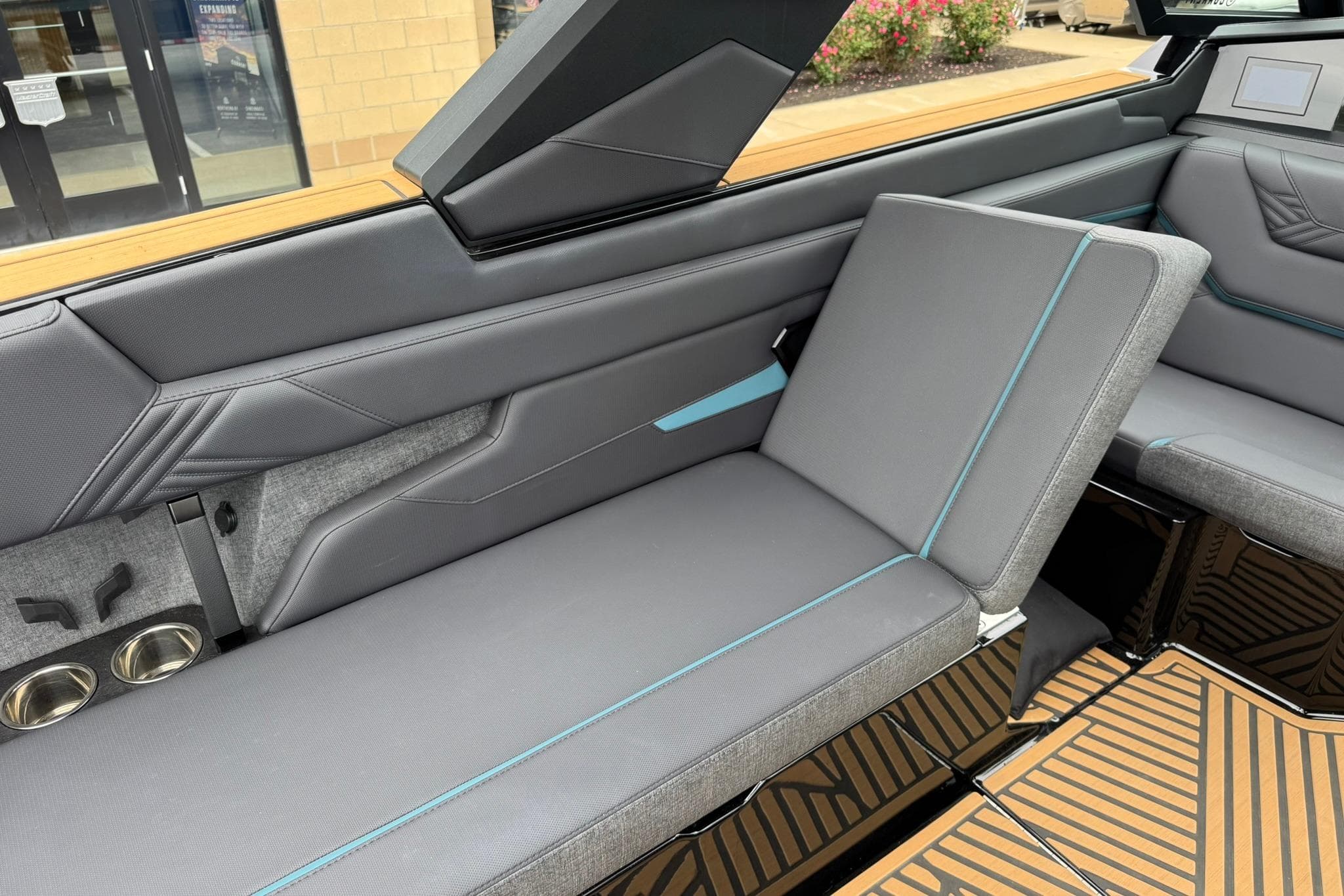 2025 MasterCraft XStar 25 interior with sleek gray seating and modern design elements.