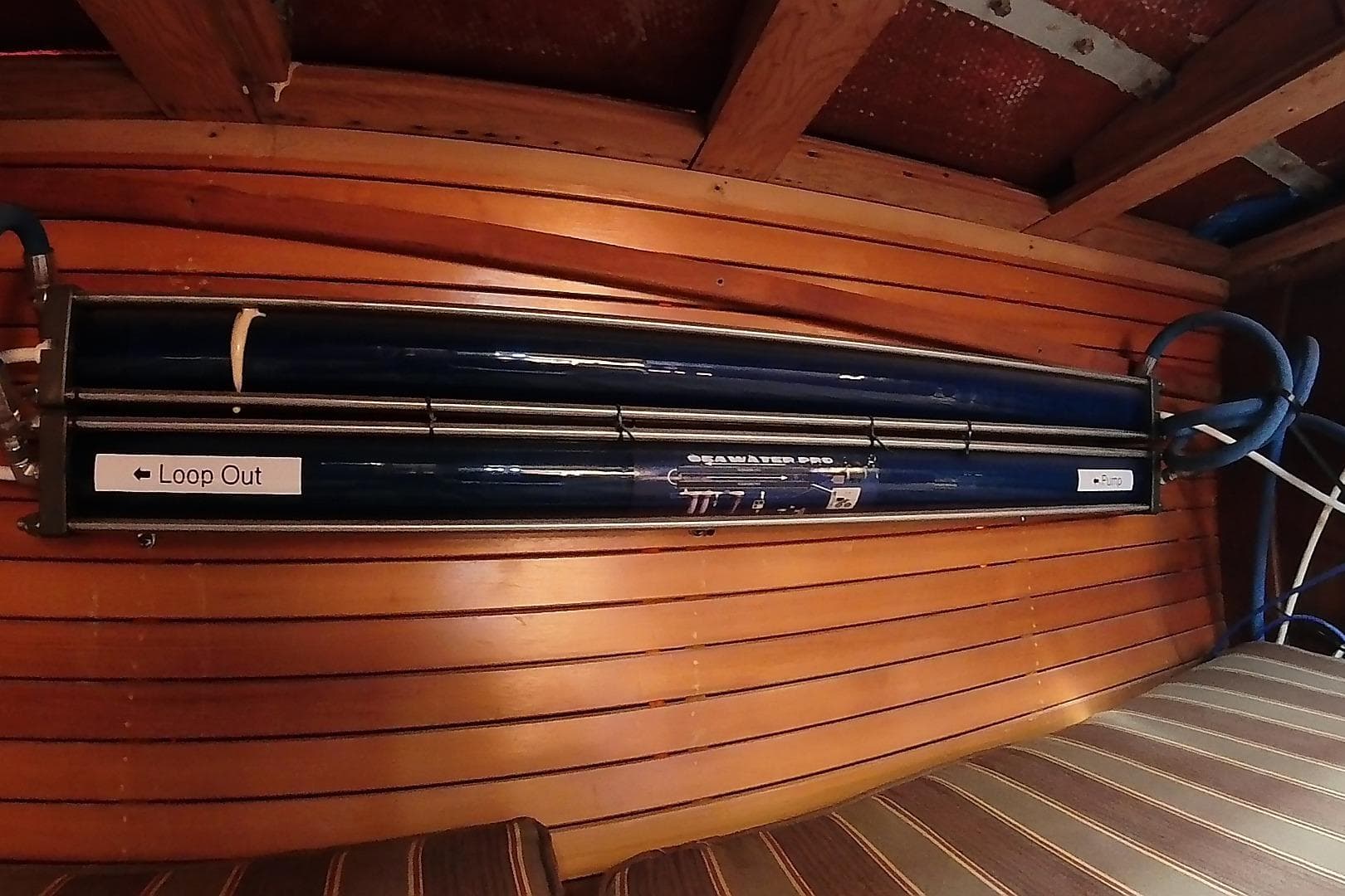 Seawater Pro system installed on 1979 Valiant 40 yacht's wooden interior wall.