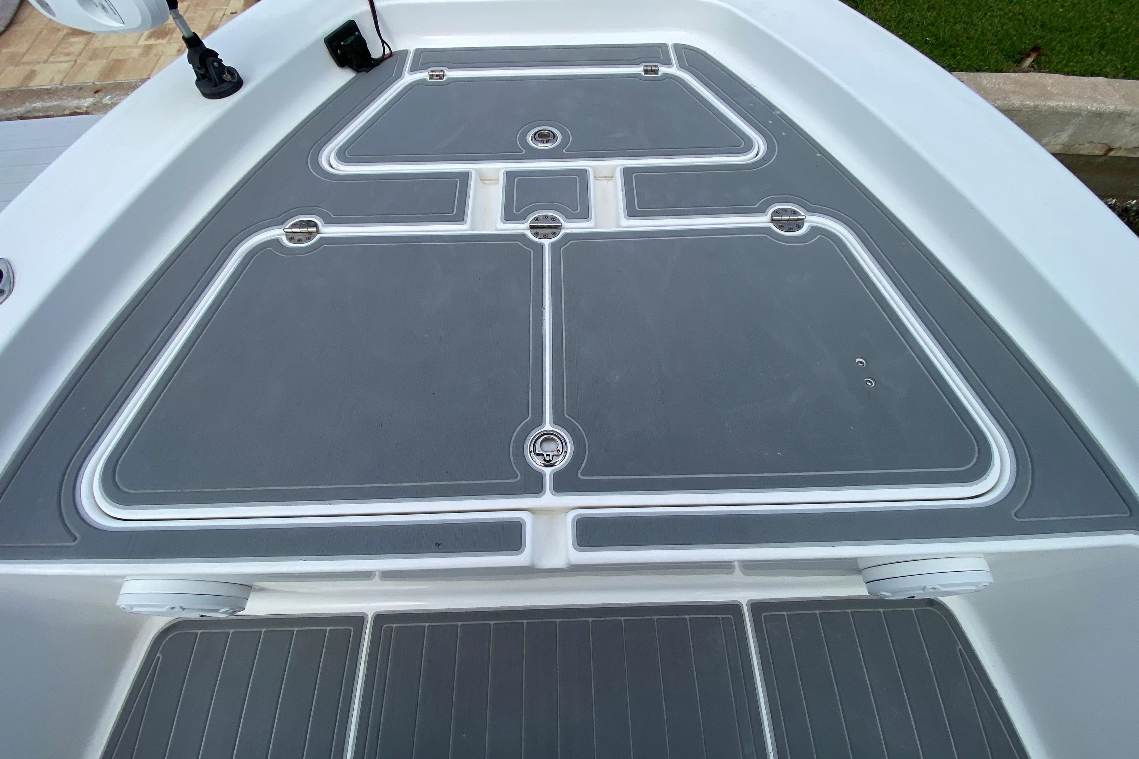2004 Palmetto 22 Excursion boat deck with storage compartments.