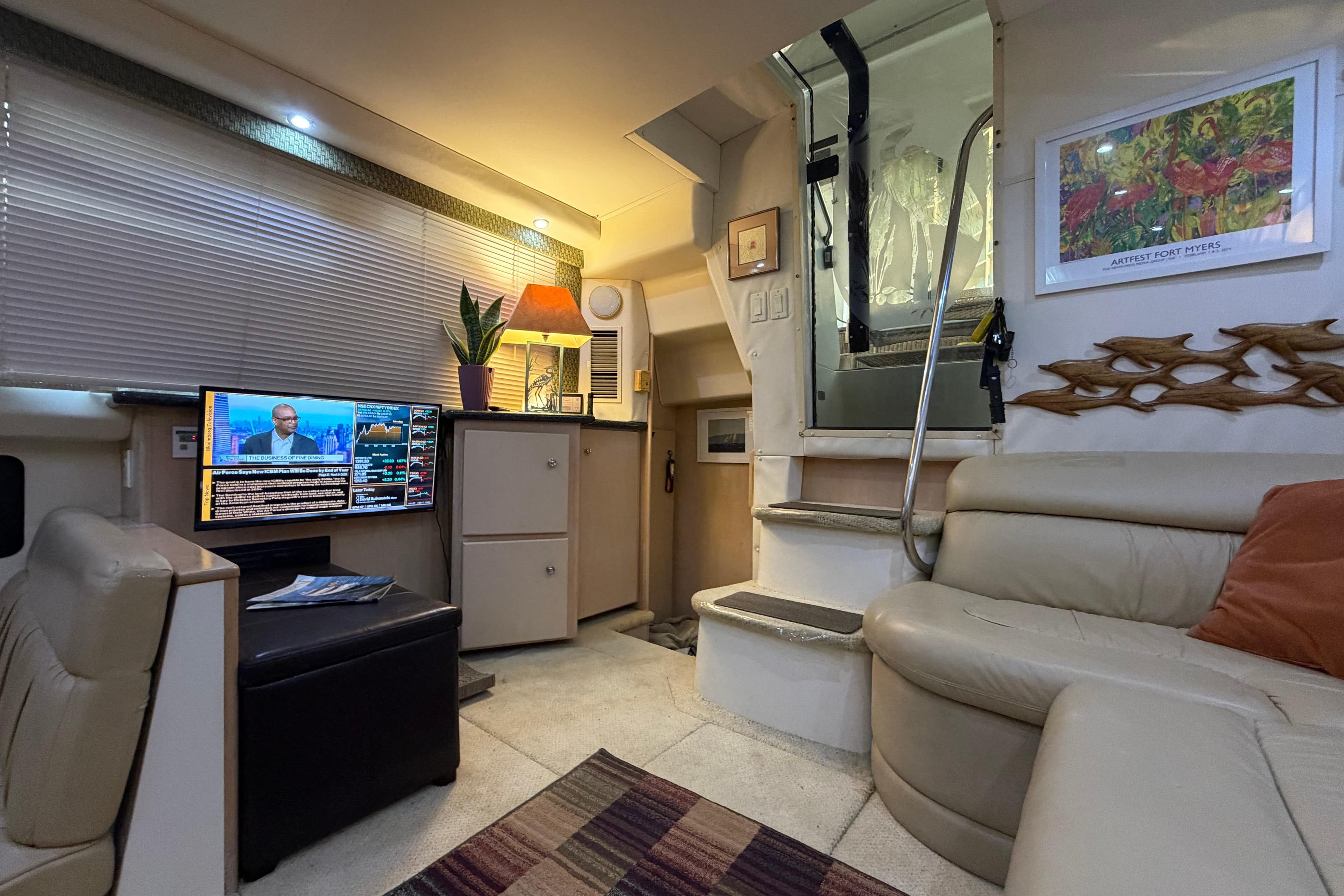 Interior of 2000 Carver 356 Aft Cabin Motor Yacht with cozy seating and modern amenities.