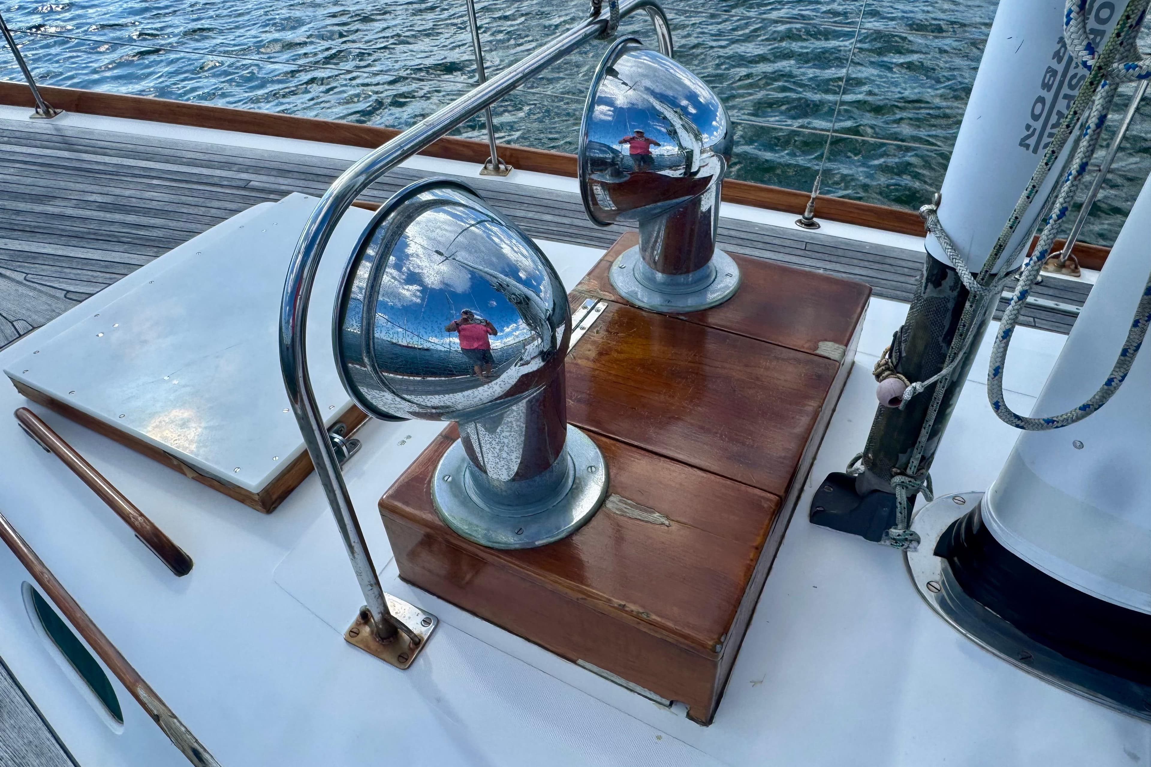 1982 Hinckley Bermuda 40 MK III sailboat deck with polished metal fixtures.