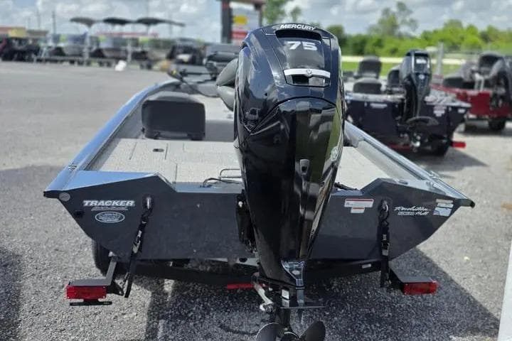 2020 Tracker Pro Team 175 TF boat with Mercury 75 engine, parked outdoors.