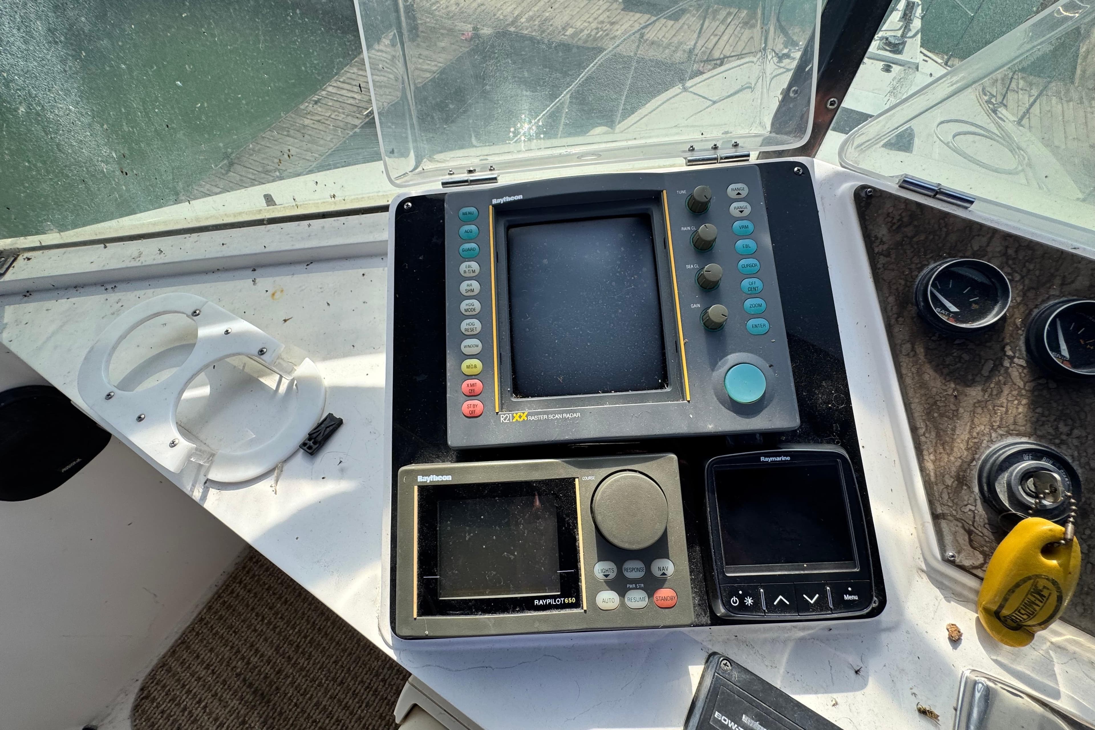 Control panel of a 1989 Hi-Star 42 Sundeck boat with navigation equipment.
