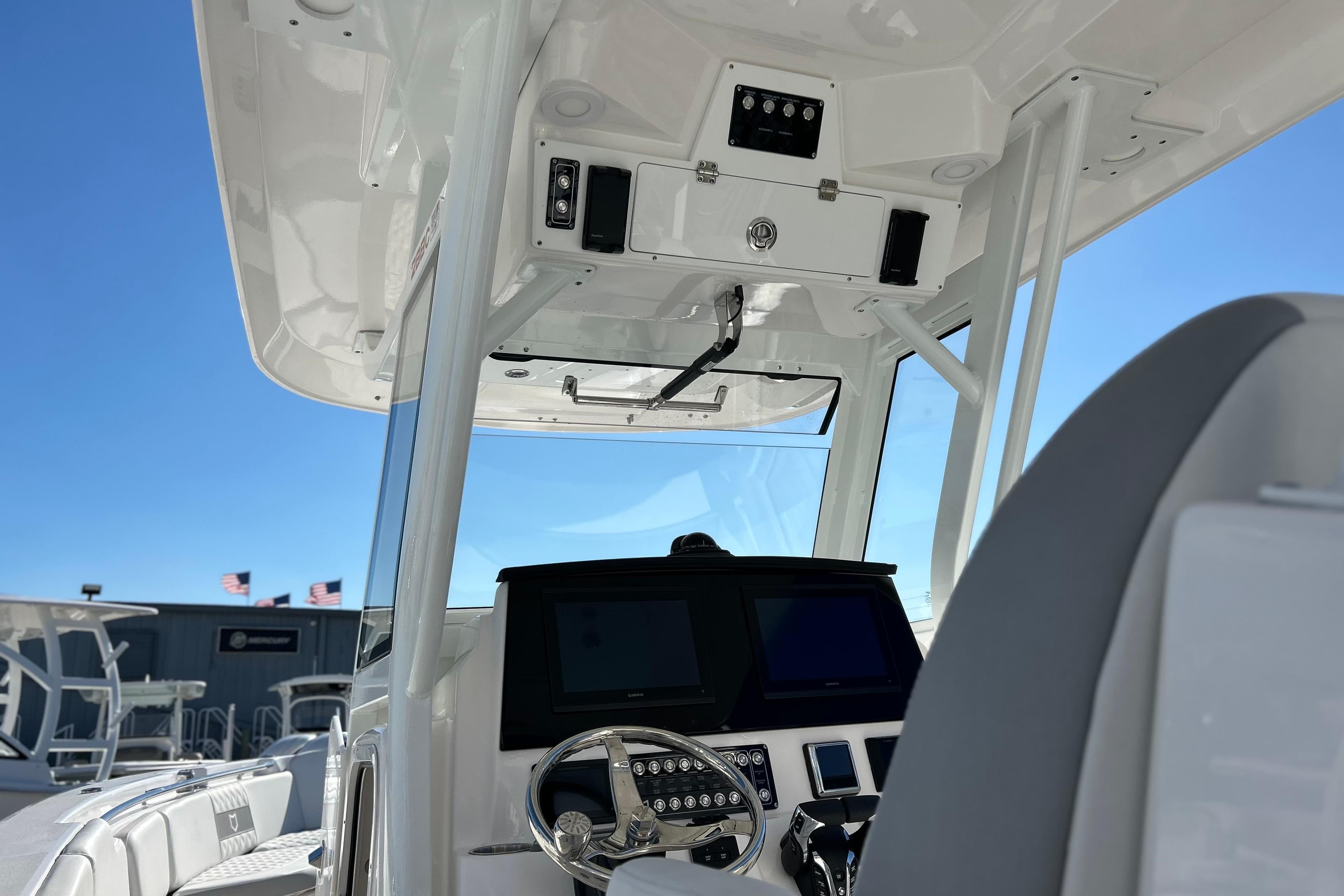 2026 Sea Fox 288 Commander boat interior with modern dashboard and steering wheel.