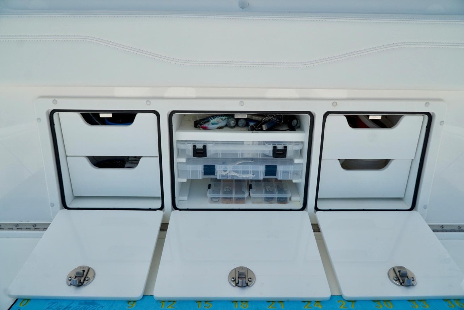 Storage compartments on a 2021 Invincible 46 Catamaran.