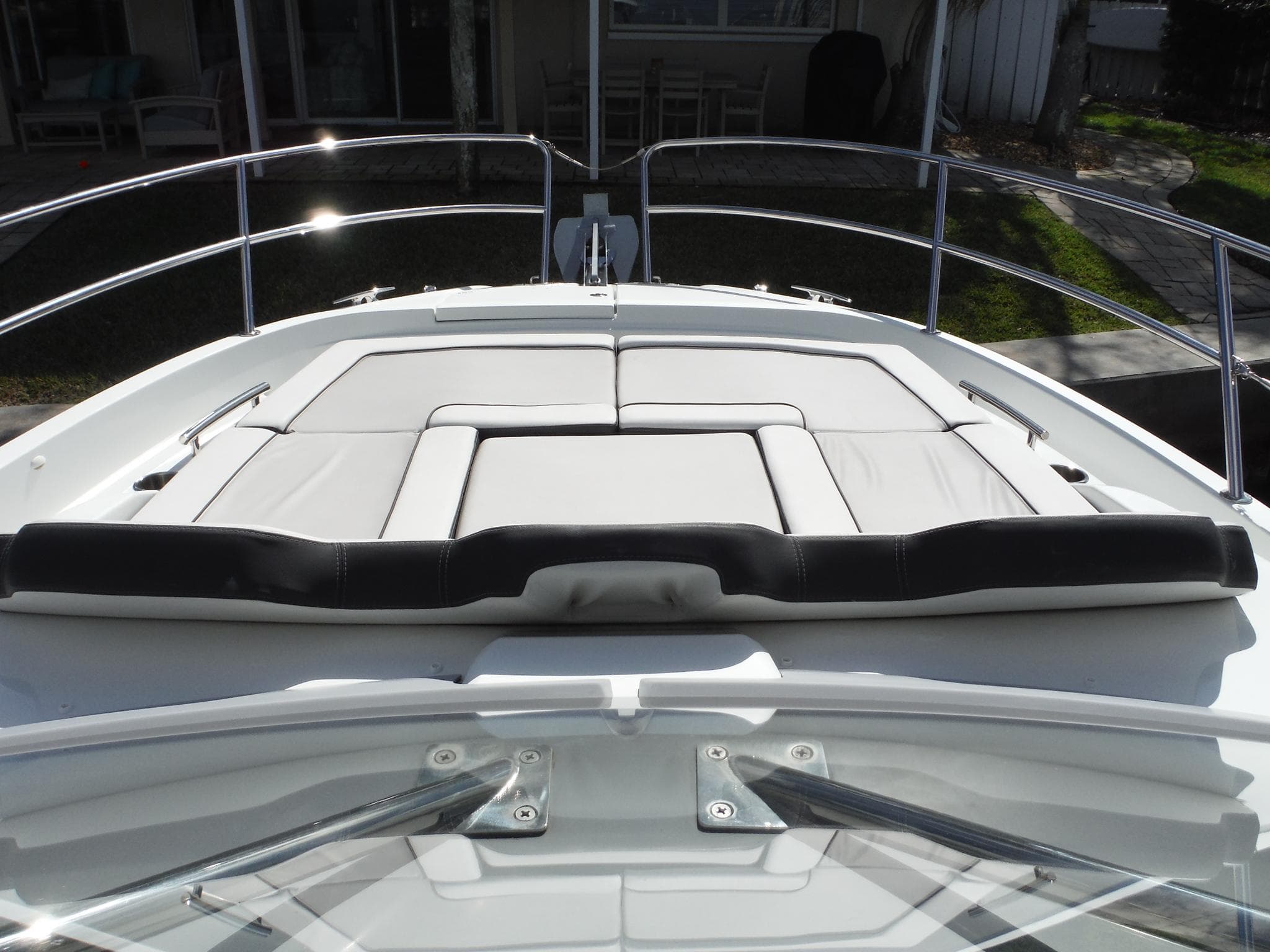 2023 Jeanneau Leader 10.5 WA Series 2 boat with cushioned deck seating.