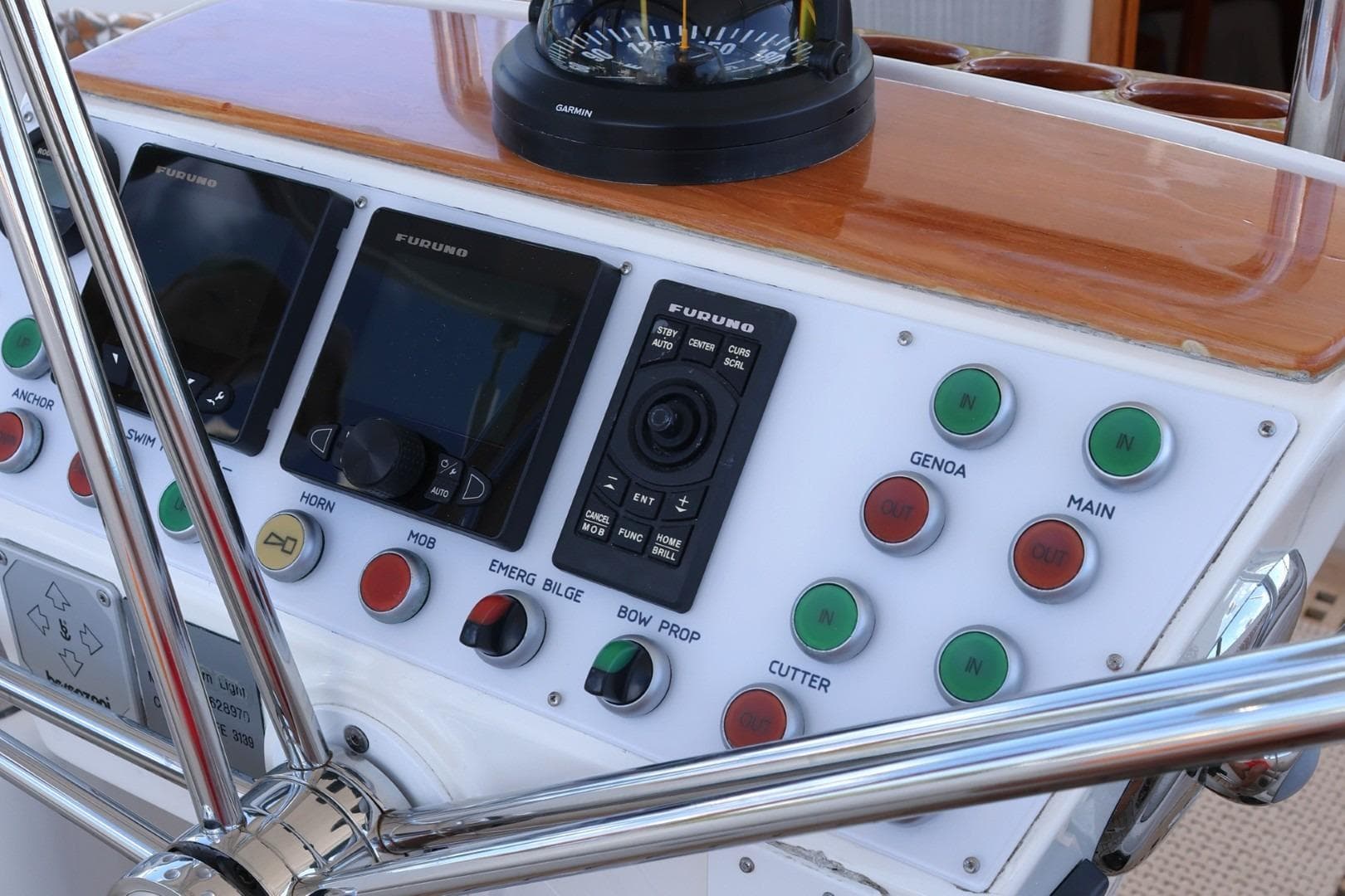 Control panel of a 2009 Hallberg-Rassy 54 yacht with navigation instruments.