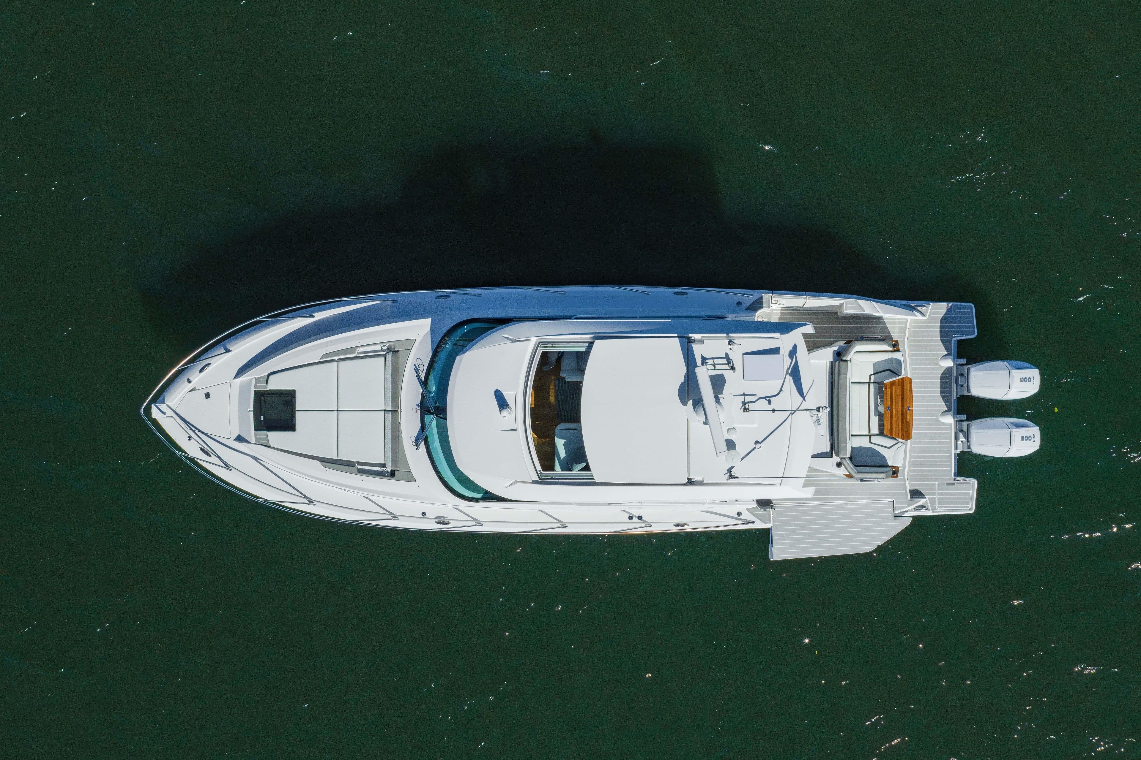 Aerial view of 2025 Tiara Yachts 43 LE luxury boat on water.