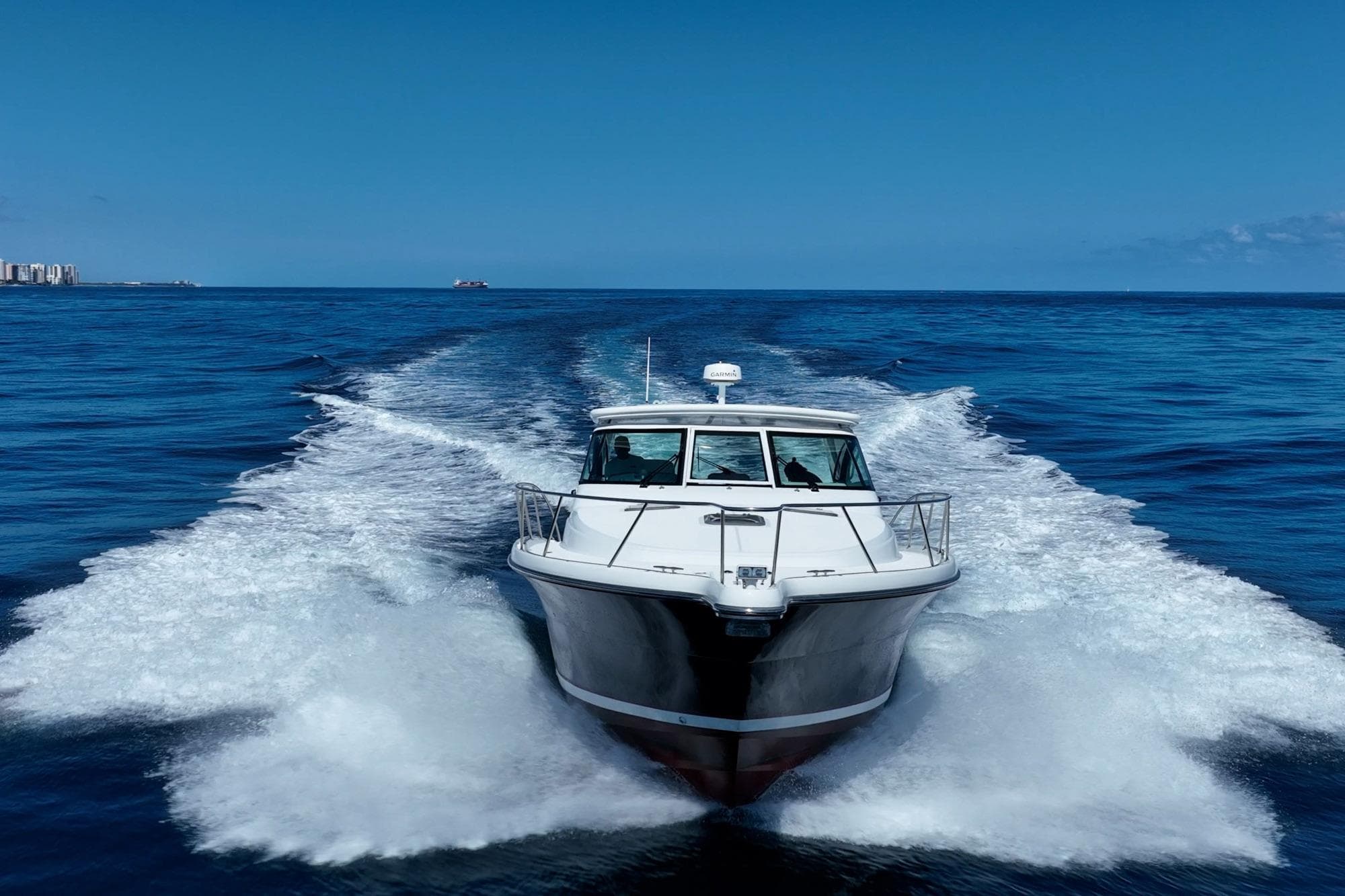 2004 Tiara Yachts 4200 Open cruising on open blue ocean waters.